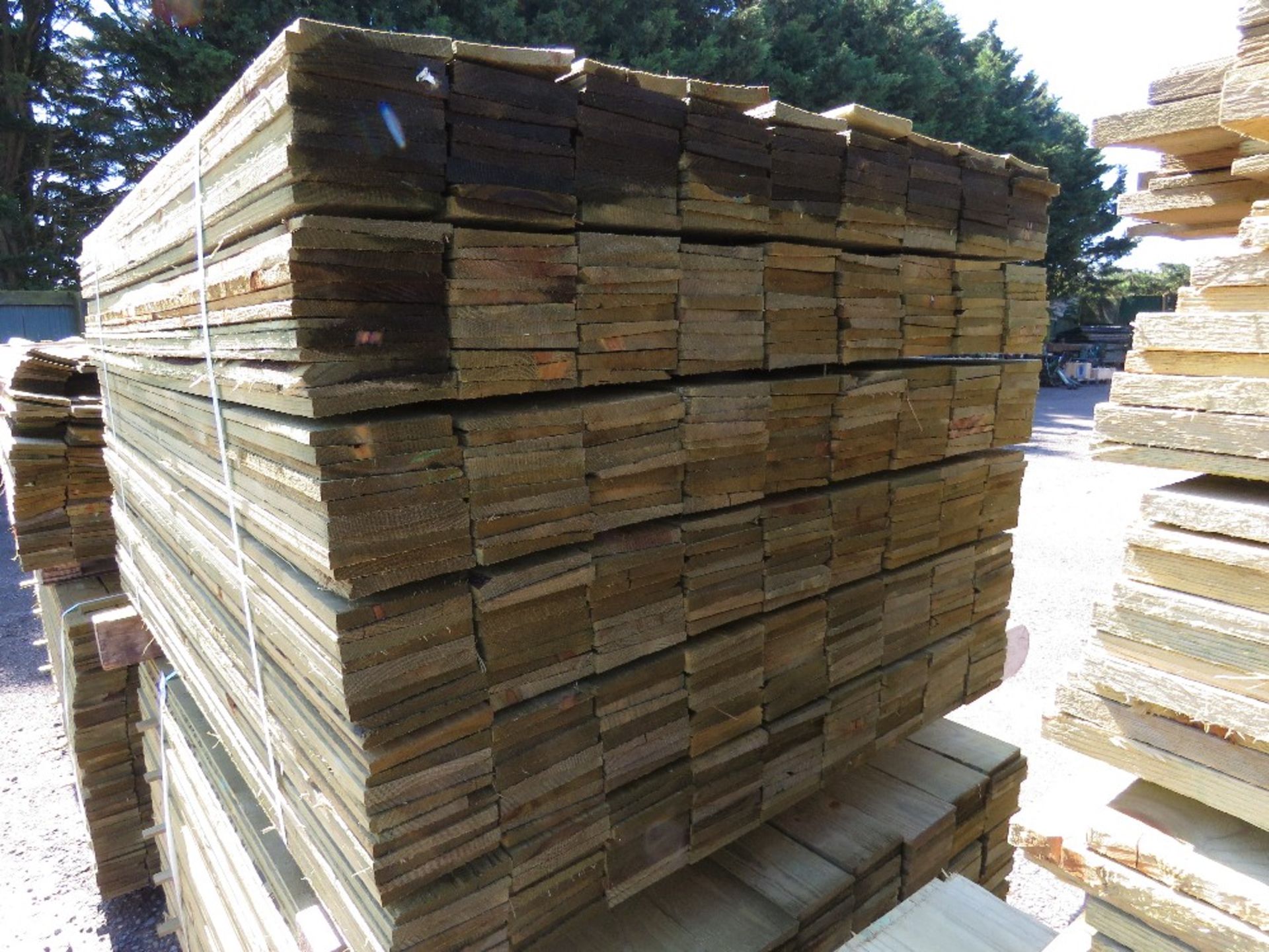 LARGE PACK OF PRESSURE TREATED FEATHER EDGE CLADDING TIMBER BOARDS 1.5M LENGTH X 100MM WIDTH APPROX. - Image 2 of 3