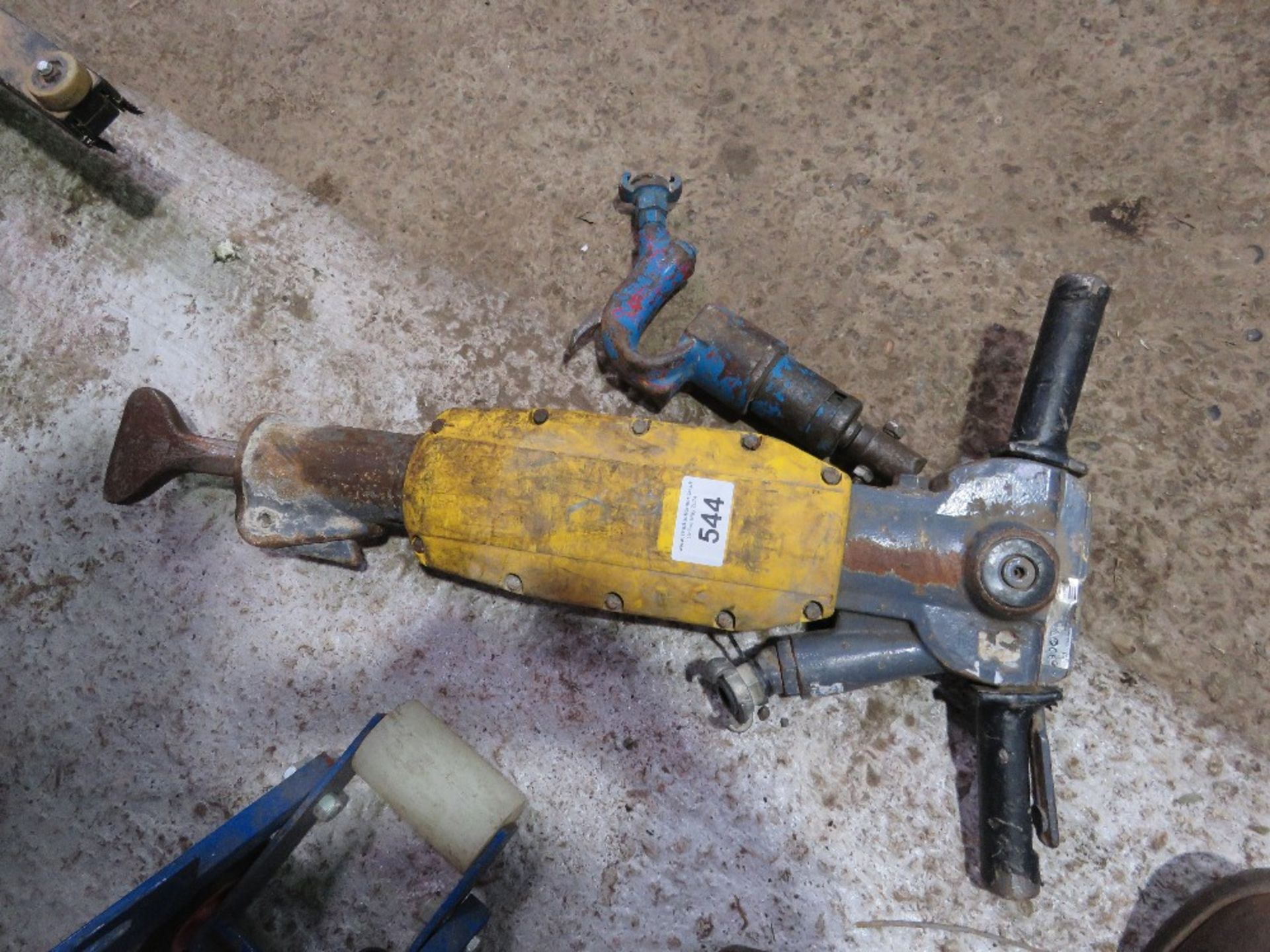 ATLAS COPCO AIR BREAKER PLUS A CHIPPING HAMMER.