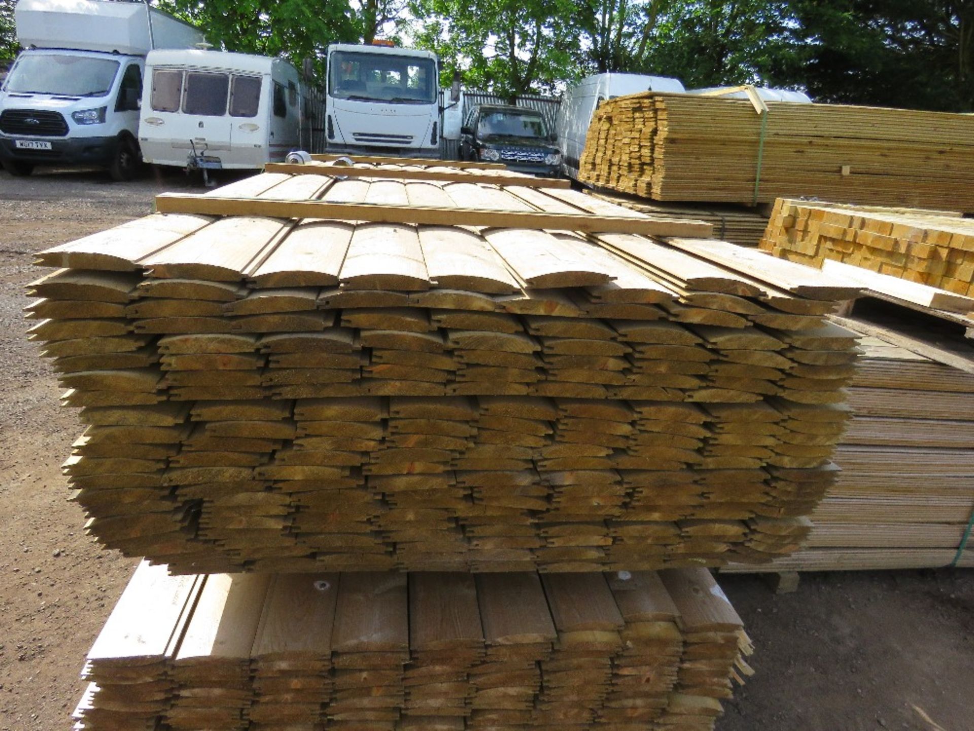 LARGE PACK OF TREATED LOG LAP CLADDING BOARDS 22MM X 125MM @ 3M LENGTH APPROX. 205NO PIECES APPROX