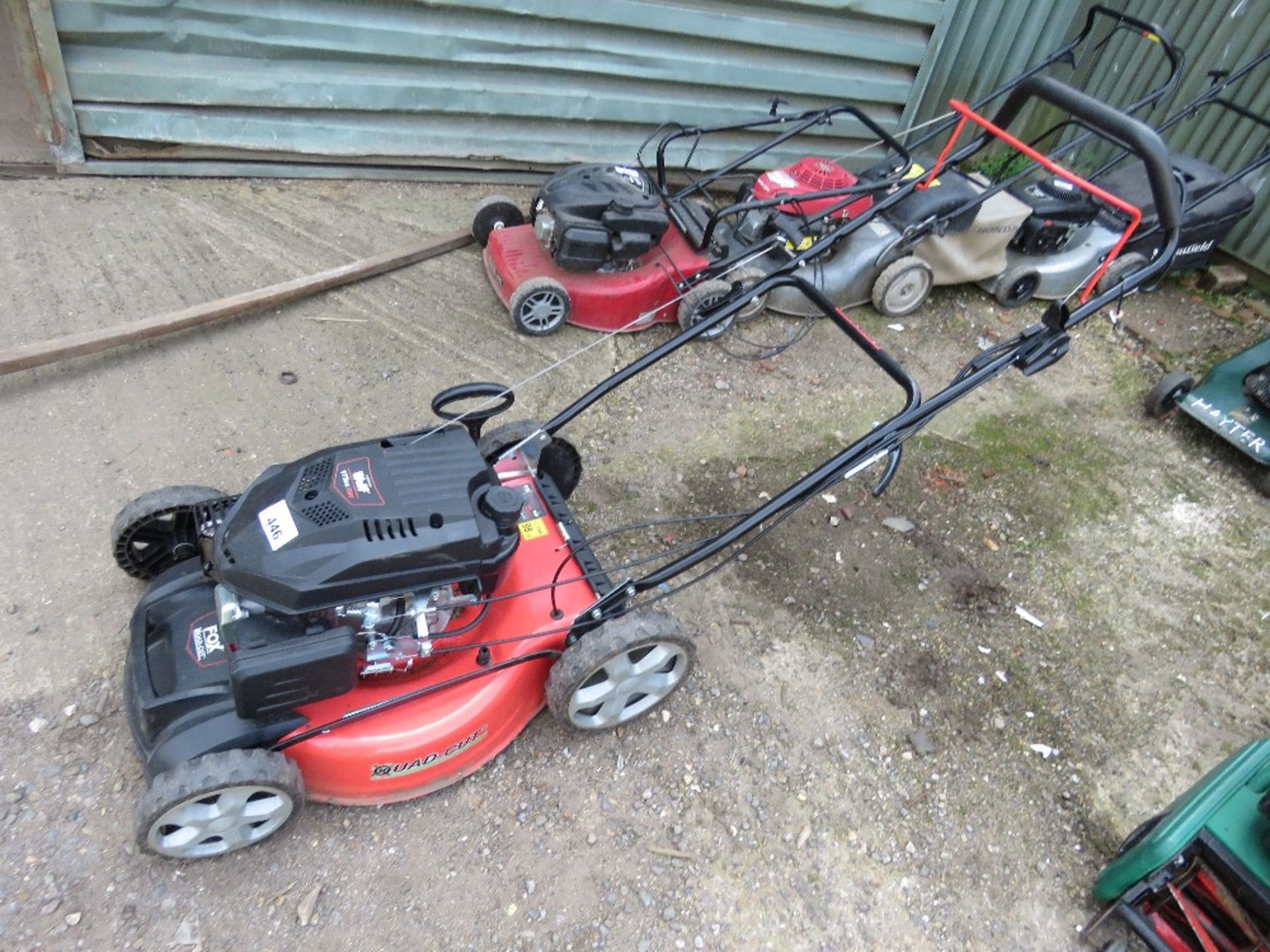 FOX QUAD CUT PETROL ENGINED MOWER WITH NO COLLECTOR. ....THIS LOT IS SOLD UNDER THE AUCTIONEERS MARG