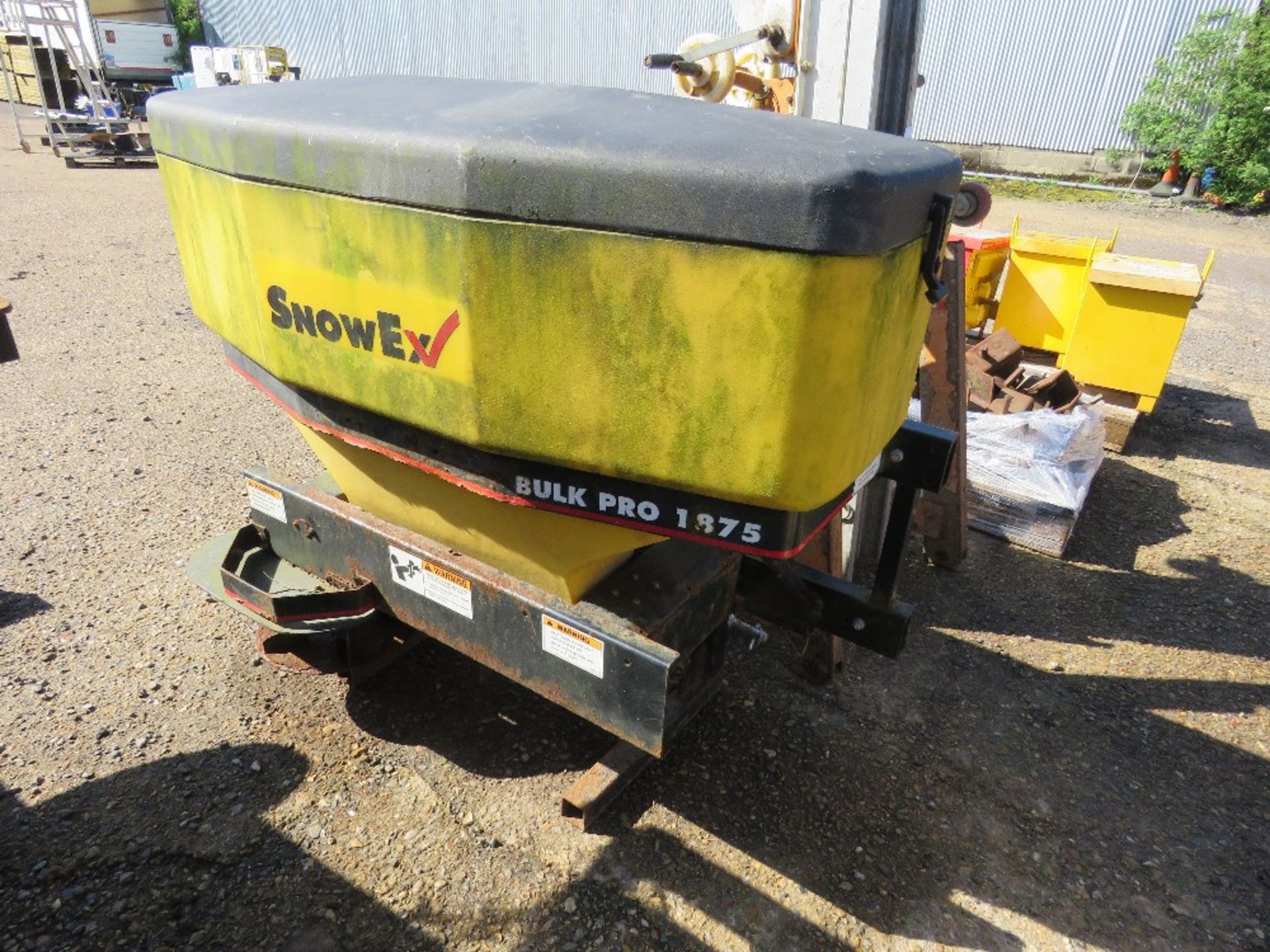 SNOWEX BULK PRO COMPACT TRACTOR MOUNTED SALT SPREADER UNIT, CONTROL INSIDE AS SHOWN.