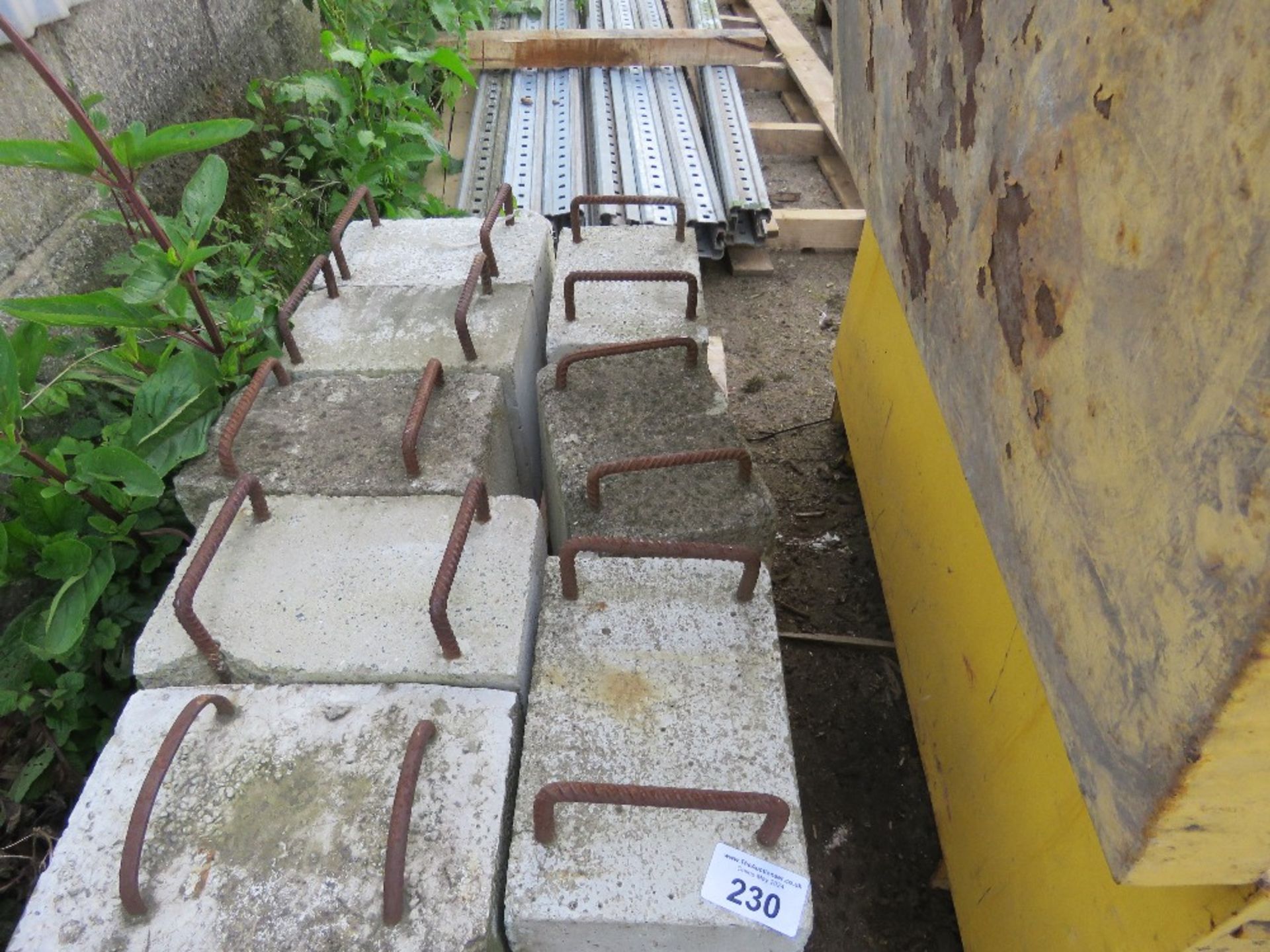 8NO CONCRETE COUNTER BALANCE WEIGHTS.....THIS LOT IS SOLD UNDER THE AUCTIONEERS MARGIN SCHEME, THERE