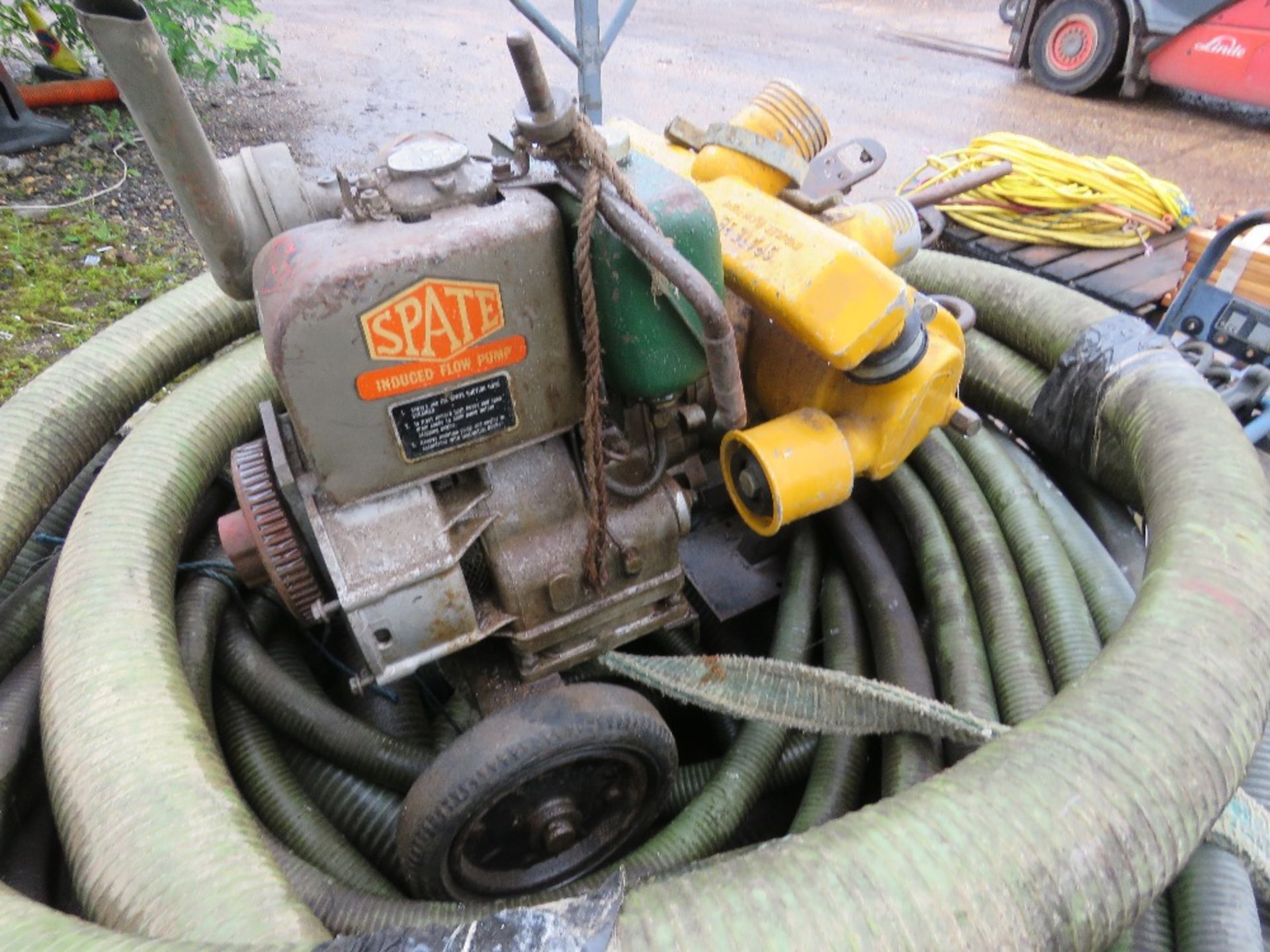 SPATE DIESEL WATER PUMP PLUS A PALLET OF SUCTION HOSES.....THIS LOT IS SOLD UNDER THE AUCTIONEERS MA