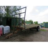 SINGLE AXLED FLAT BED BALE TRAILER, 20FT X 8FT BED APPROX ON SUPER SINGLE WHEELS.....THIS LOT IS SOL