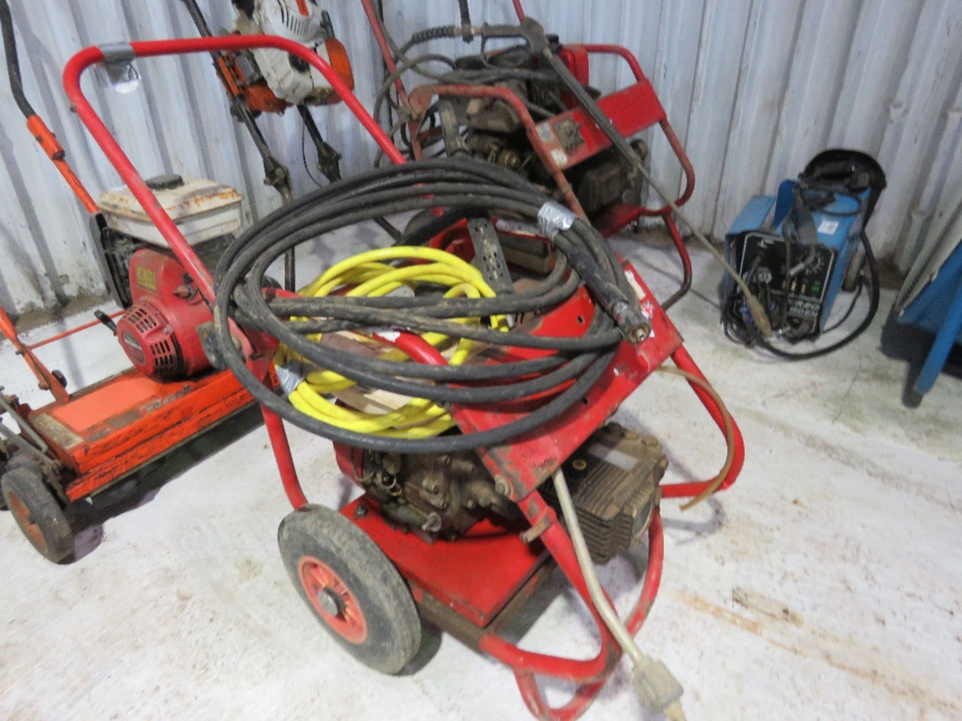 PETROL ENGINED PRESSURE WASHER WITH HOSE AND LANCE.