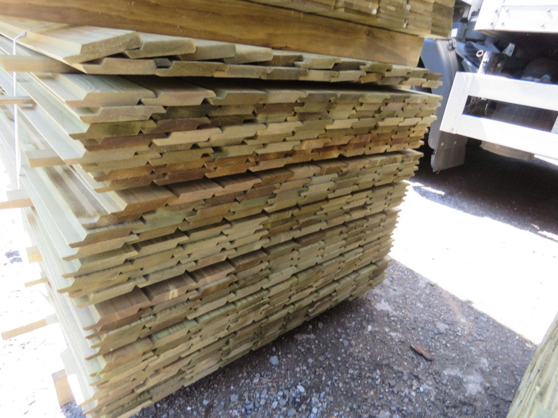 LARGE PACK OF PRESSURE TREATED SHIPLAP CLADDING TIMBER BOARDS 1.83M LENGTH X 100MM WIDTH APPROX. - Image 2 of 3