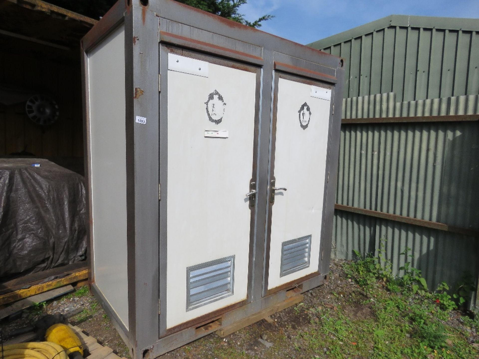 TWIN COMPARTMENT MAINS TOILET CABIN, 7FT X 4FT APPROX WITH ELECTRIC HOOK UP. ....THIS LOT IS SOLD UN