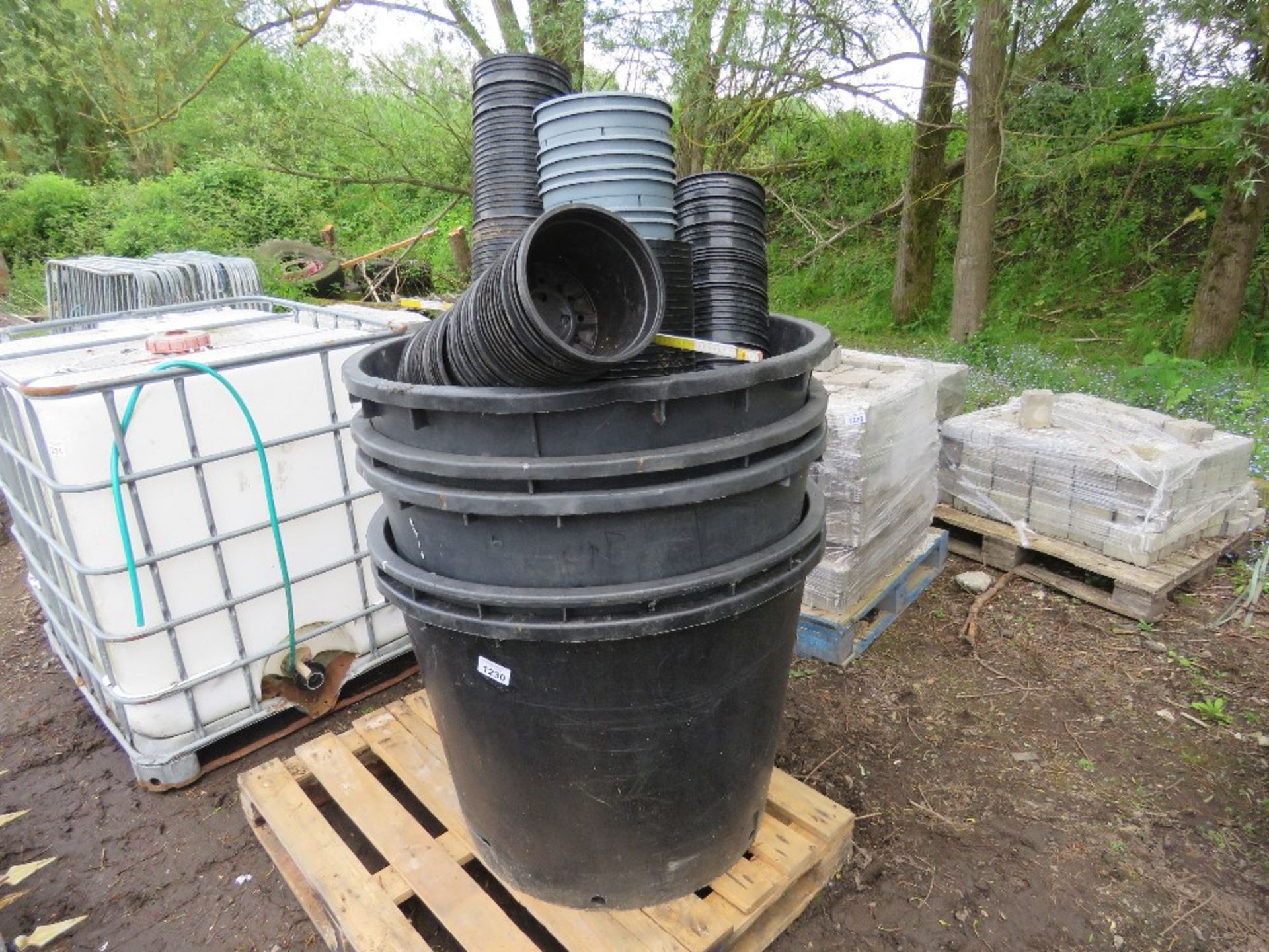 PALLET OF ASSORTED PLANT & TREE POTS.....THIS LOT IS SOLD UNDER THE AUCTIONEERS MARGIN SCHEME, THERE