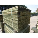 LARGE PACK OF PRESSURE TREATED FEATHER EDGE CLADDING TIMBER BOARDS 1.5M LENGTH X 100MM WIDTH APPROX.