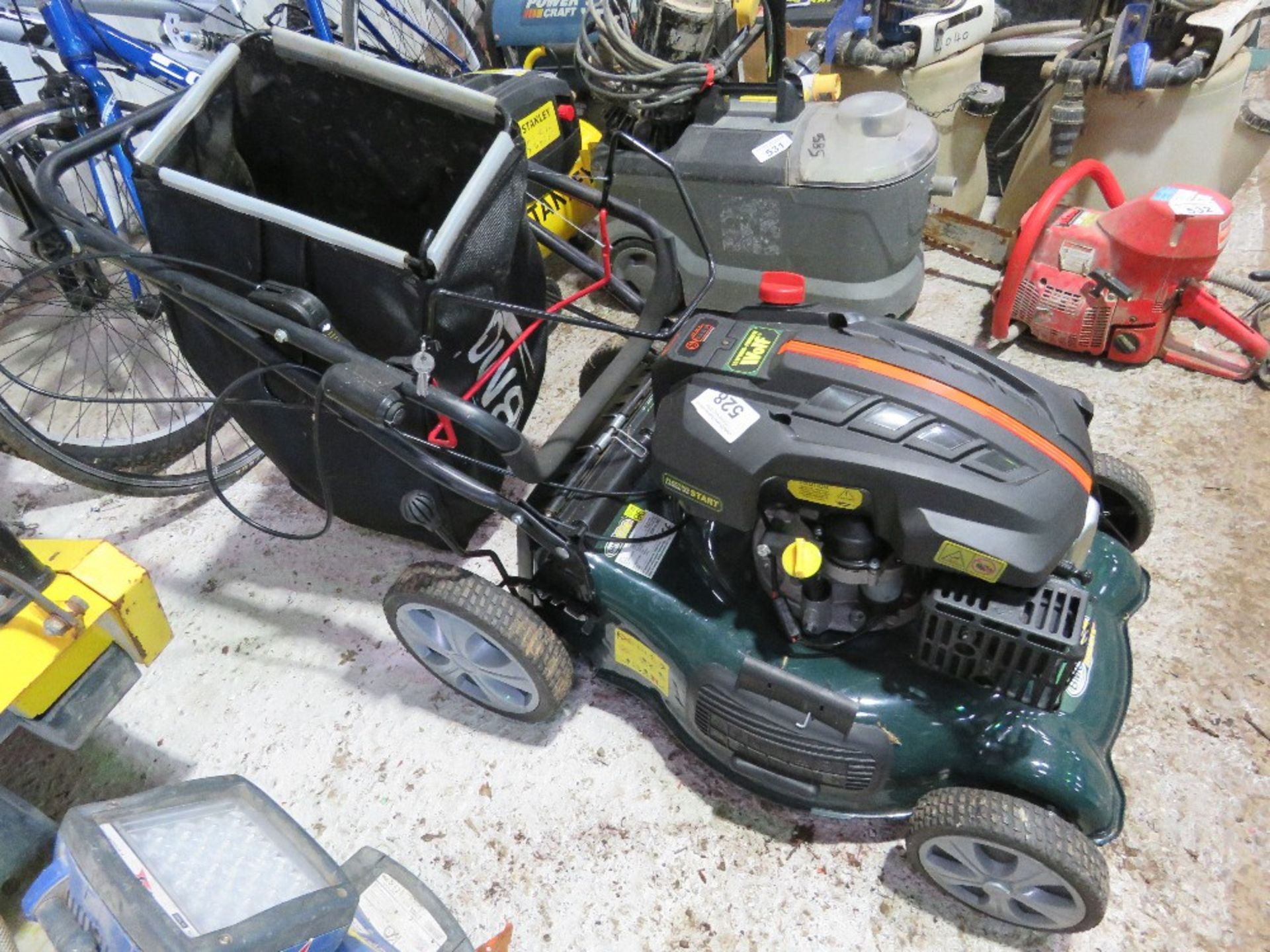 WOLF PETROL ENGINED MOWER WITH BATTERY POWERED STARTER.....THIS LOT IS SOLD UNDER THE AUCTIONEERS MA