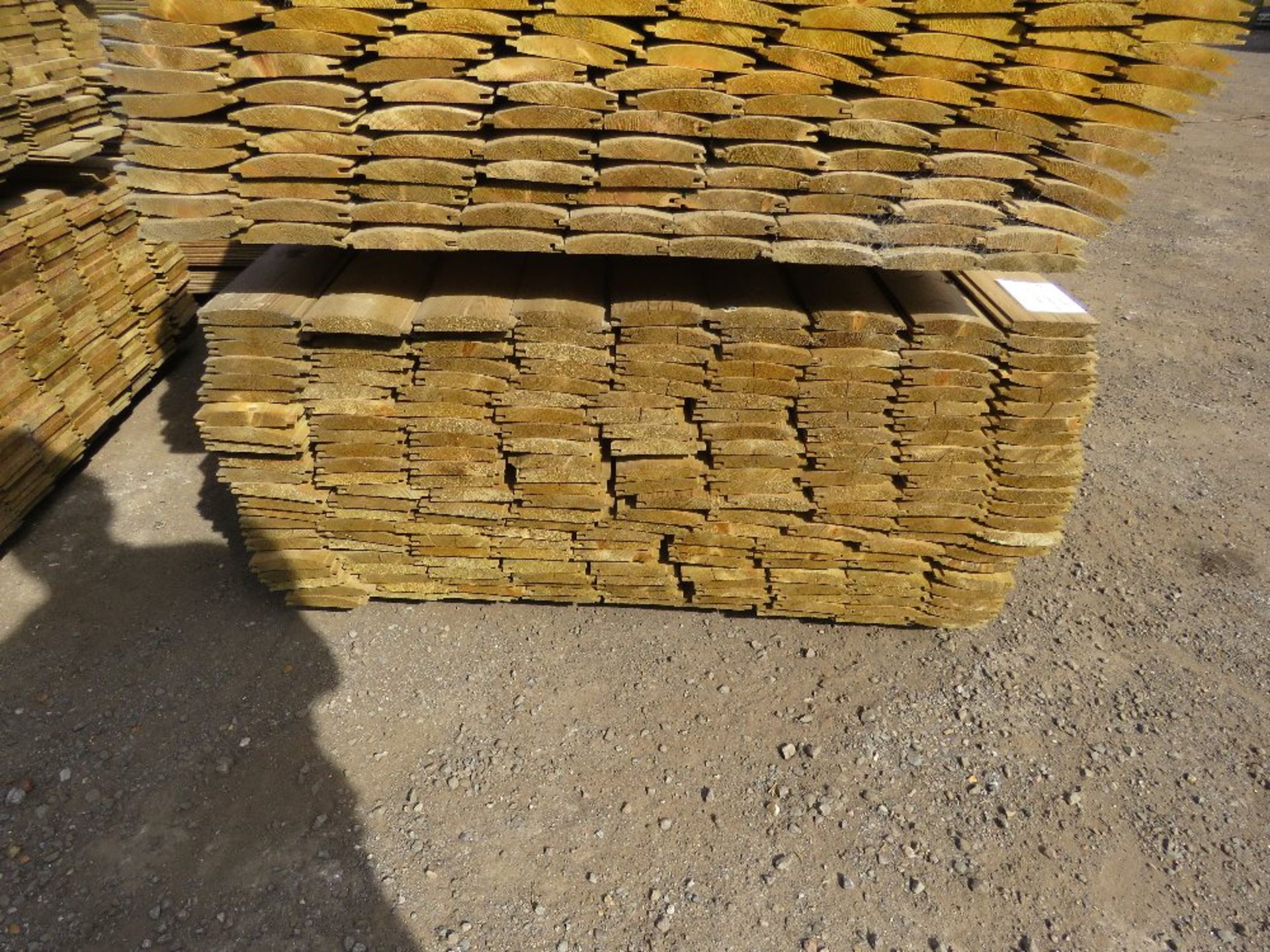 LARGE PACK OF TREATED LOG LAP CLADDING BOARDS 22MM X 125MM @ 3M LENGTH APPROX. 207NO PIECES APPROX - Image 3 of 4