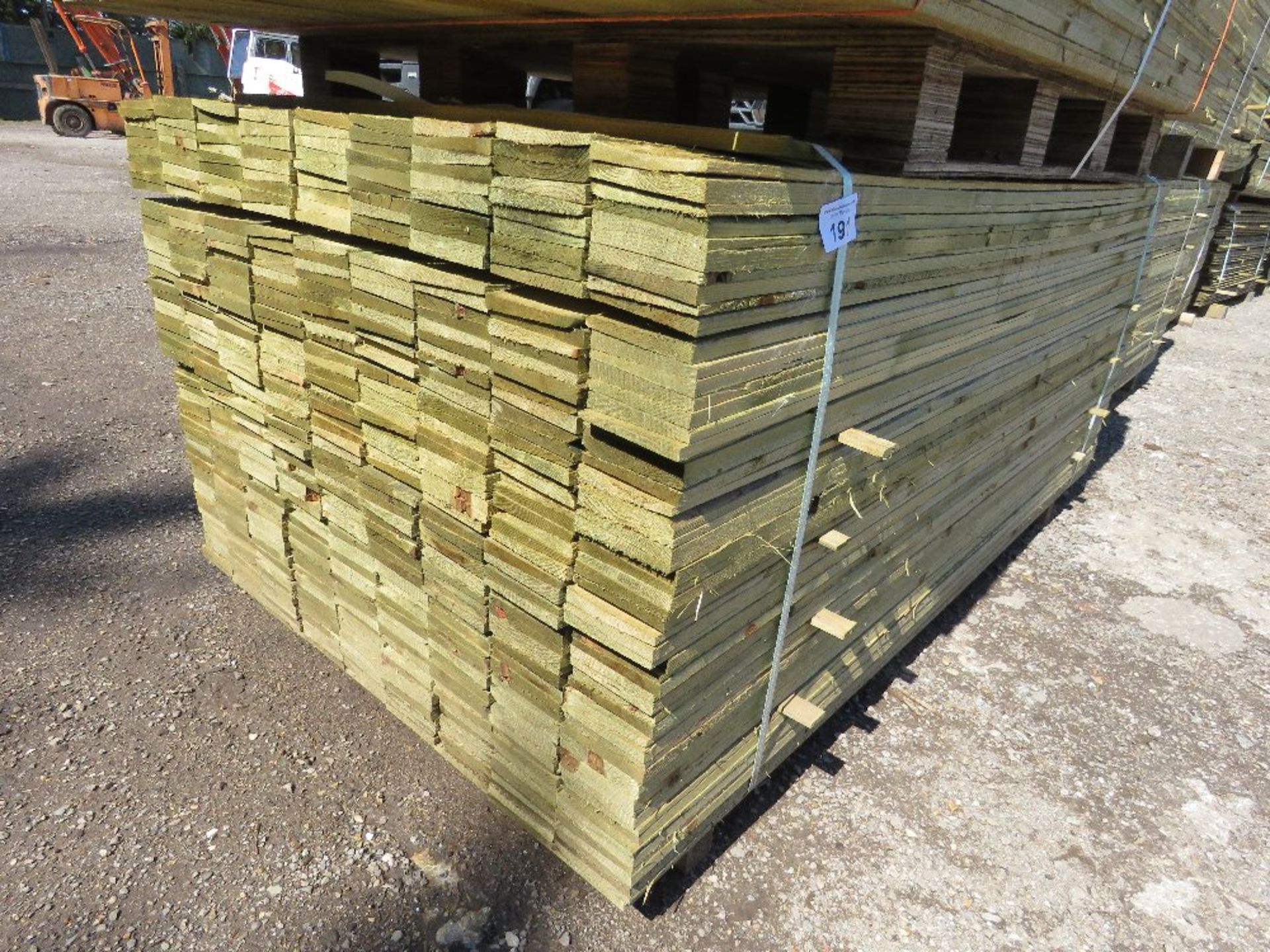 LARGE PACK OF PRESSURE TREATED FEATHER EDGE CLADDING TIMBER BOARDS 1.8M LENGTH X 100MM WIDTH APPROX.