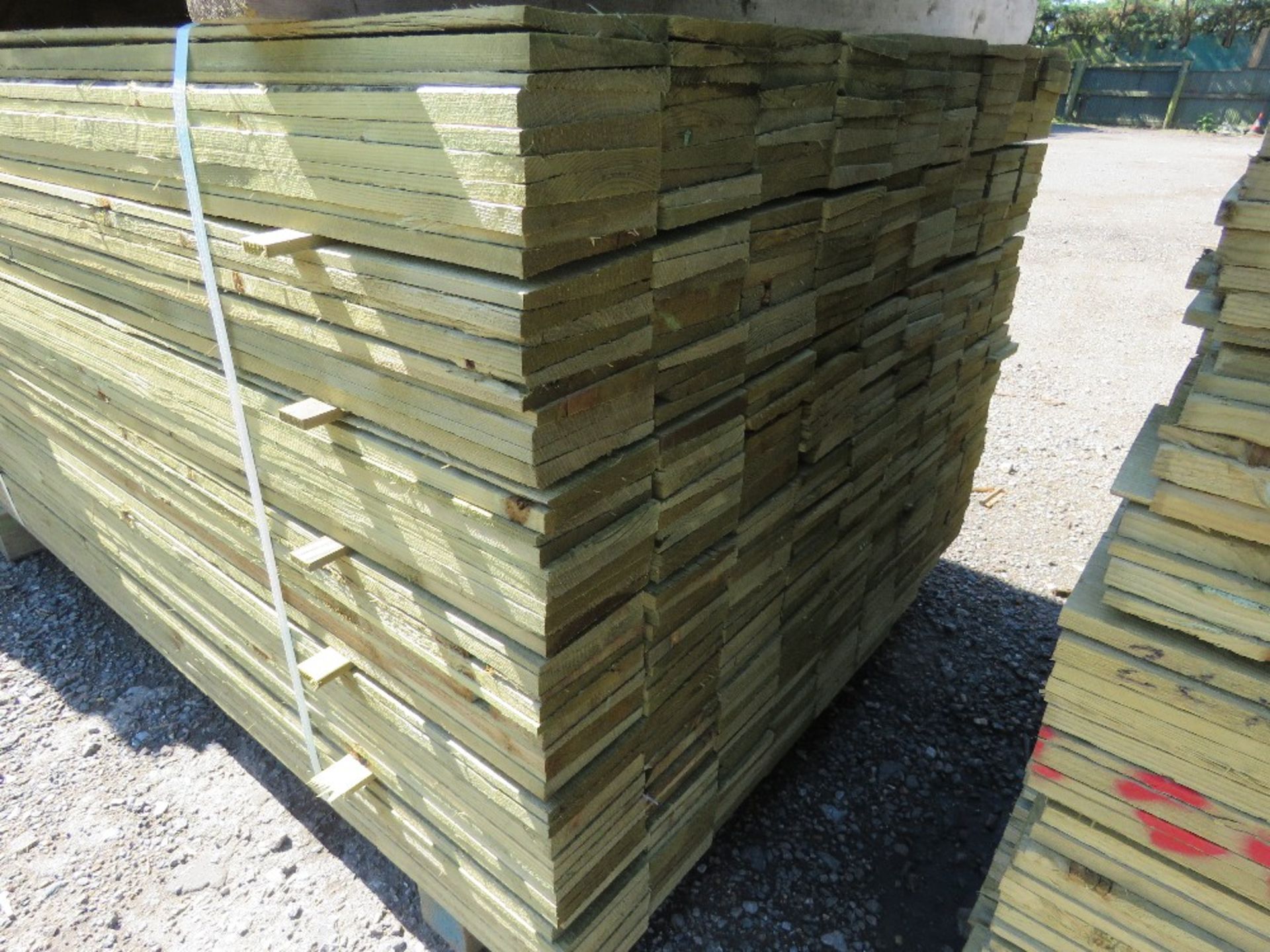 LARGE PACK OF PRESSURE TREATED FEATHER EDGE CLADDING TIMBER BOARDS 1.5M LENGTH X 100MM WIDTH APPROX. - Image 2 of 3