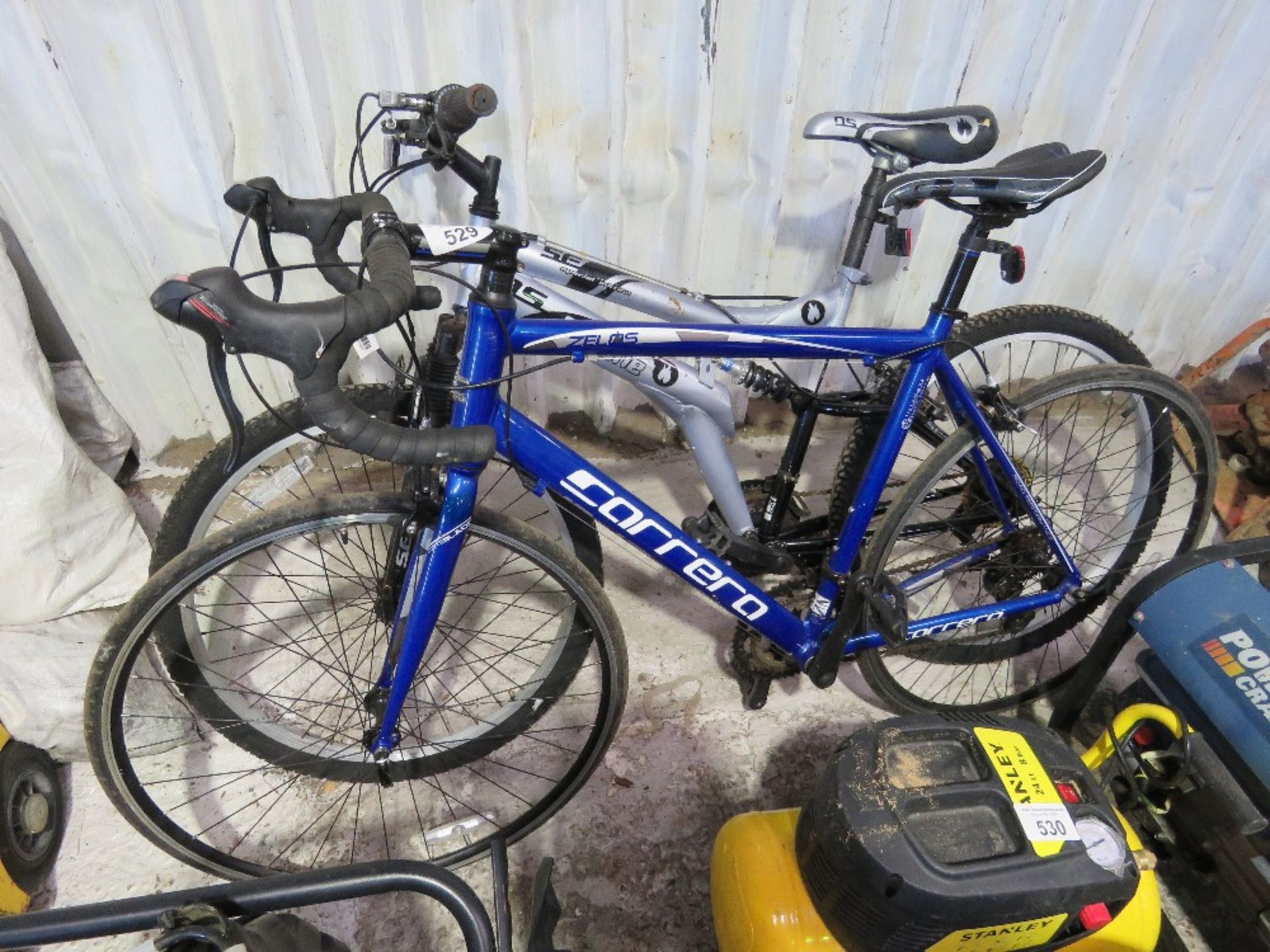 CARRERA RACING BIKE PLUS AN OCTANE MOUNTAIN BIKE.....THIS LOT IS SOLD UNDER THE AUCTIONEERS MARGIN S