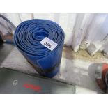 ROLL OF LAREG BORE LAY FLAT HOSE.....THIS LOT IS SOLD UNDER THE AUCTIONEERS MARGIN SCHEME, THEREFORE