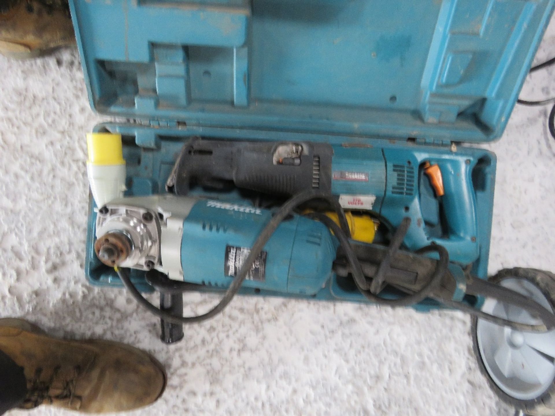 MAKITA 110VOLT GRINDER PLUS A RECIPROCATING SAW.....THIS LOT IS SOLD UNDER THE AUCTIONEERS MARGIN SC