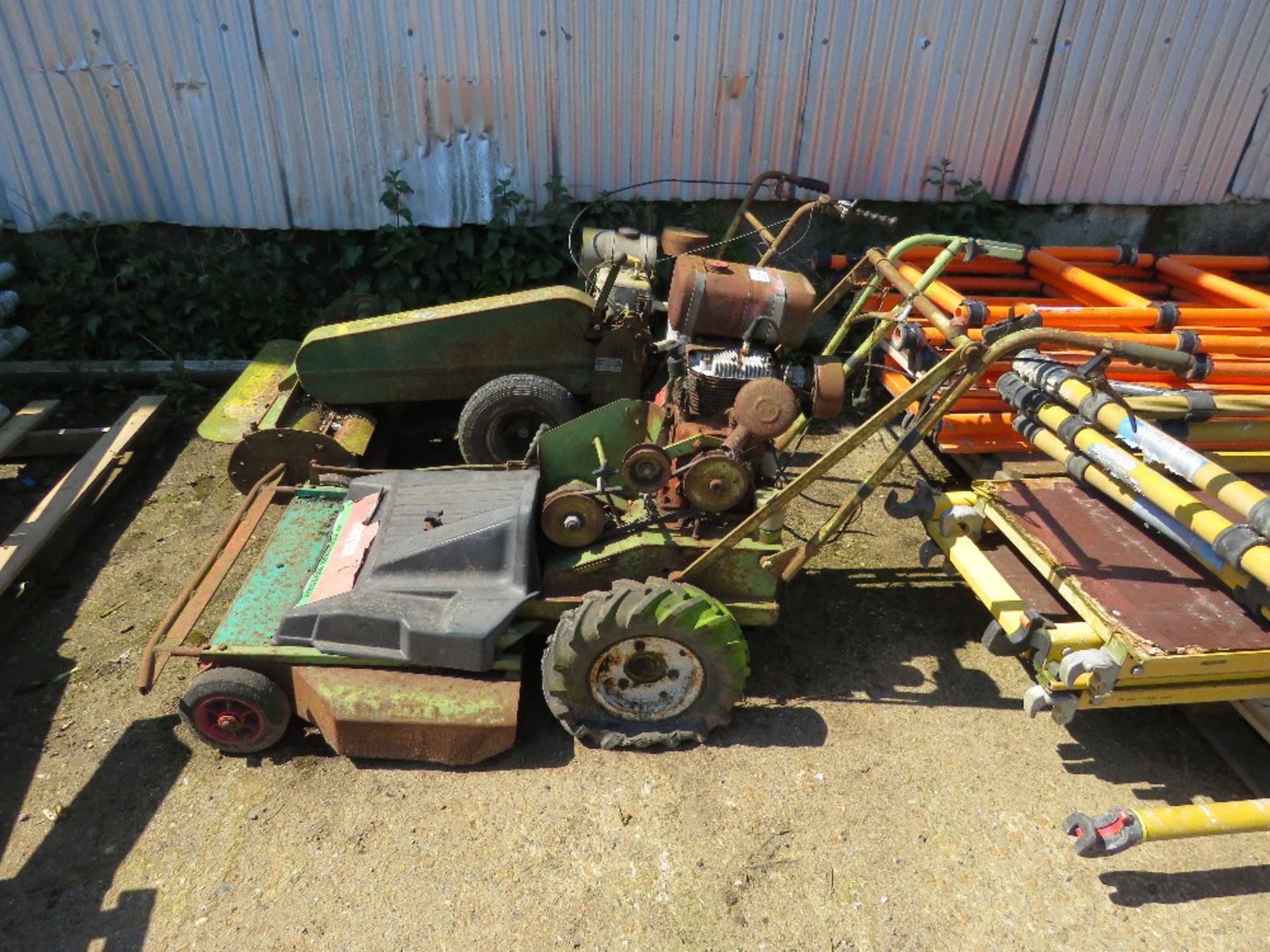 2 X PETROL ENGINED ROUGH CUT MOWERS....THIS LOT IS SOLD UNDER THE AUCTIONEERS MARGIN SCHEME, THEREFO