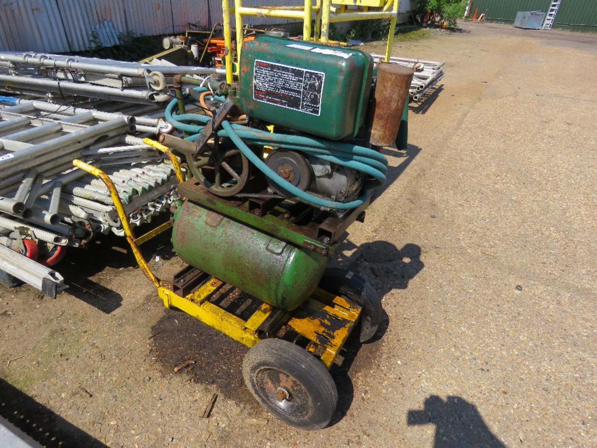 OLD DIESEL ENGINED COMPRESSOR ON WHEELS.....THIS LOT IS SOLD UNDER THE AUCTIONEERS MARGIN SCHEME, TH
