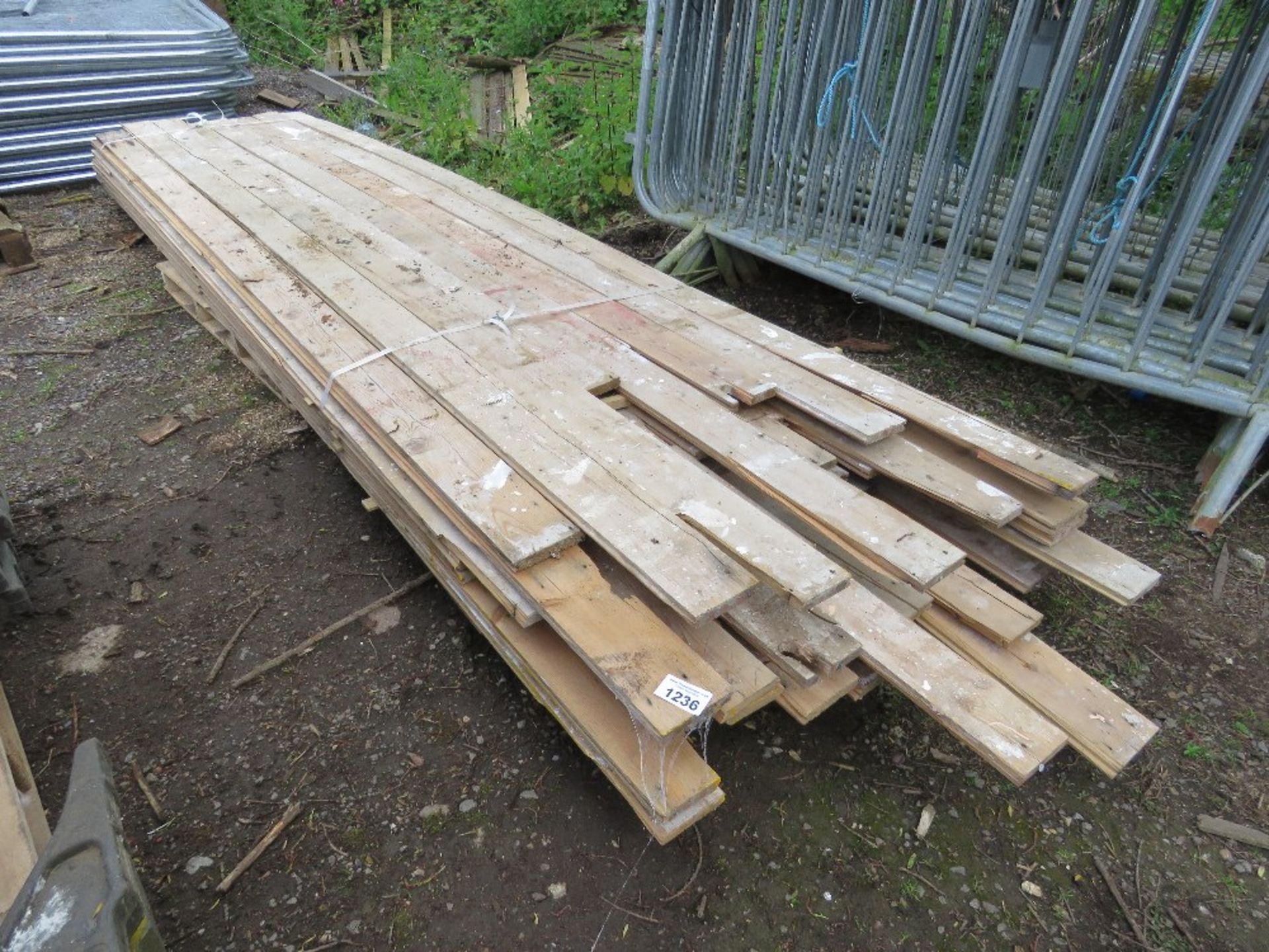 PALLET OF ASSORTED PRE USED FLOORBOARDS AND TIMBERS 10-14FT LENGTH APPROX.....THIS LOT IS SOLD UNDER - Image 2 of 3