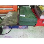 TILE SAW 240VOLT POWERED PLUS A MANUAL TILE CUTTER.....THIS LOT IS SOLD UNDER THE AUCTIONEERS MARGI