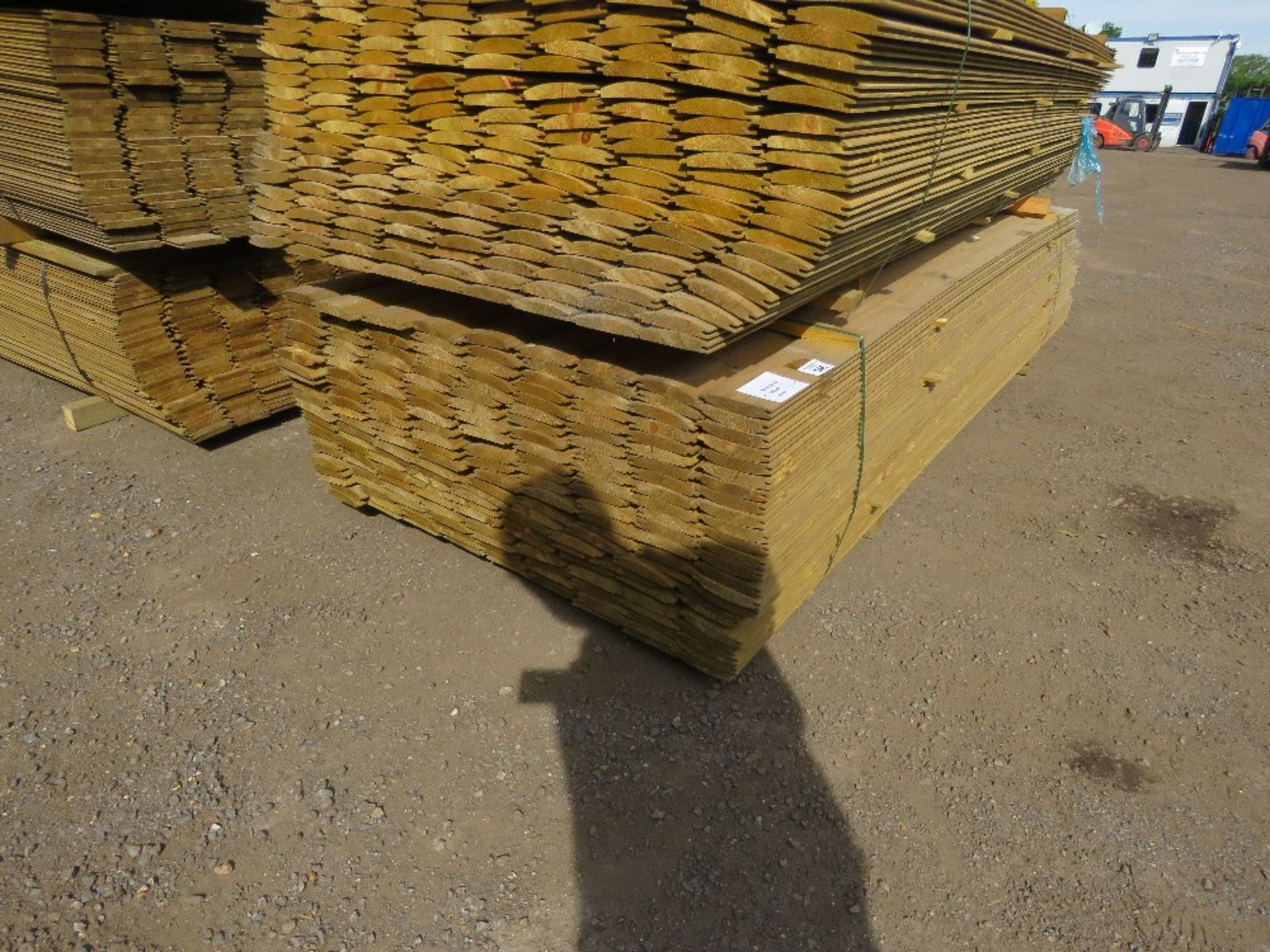 LARGE PACK OF TREATED LOG LAP CLADDING BOARDS 22MM X 125MM @ 3M LENGTH APPROX. 207NO PIECES APPROX - Image 2 of 4