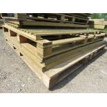 STACK OF ASSORTED FENCE PANELS AND TIMBERS AS SHOWN.