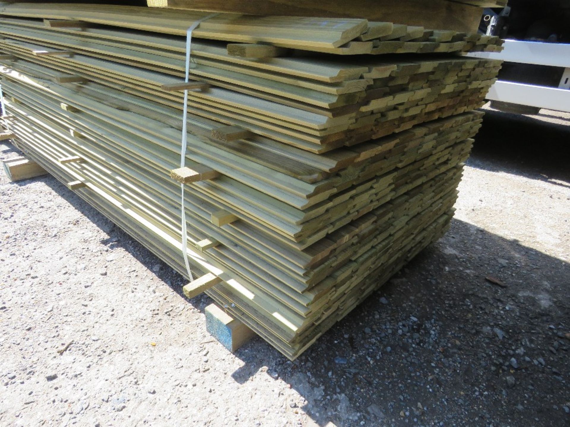 LARGE PACK OF PRESSURE TREATED SHIPLAP CLADDING TIMBER BOARDS 1.83M LENGTH X 100MM WIDTH APPROX.