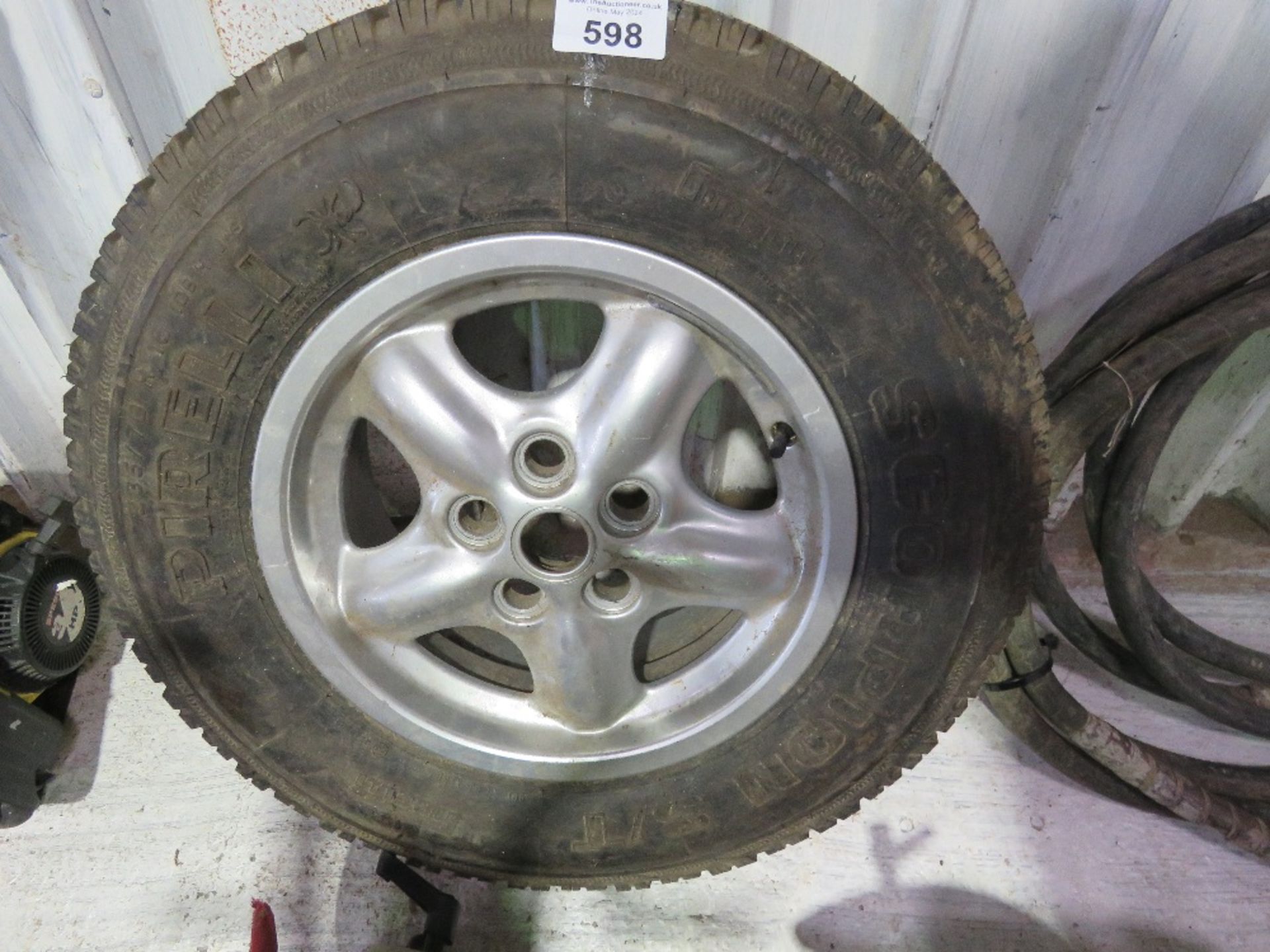 LANDROVER TYPE ALLOY WHEEL 235-70R16 OWNER MOVING HOUSE.....THIS LOT IS SOLD UNDER THE AUCTIONEERS M