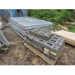 STACK OF 20NO HERAS TYPE TEMPORARY SITE FENCE PANELS WITH A PALLET OF FEET.