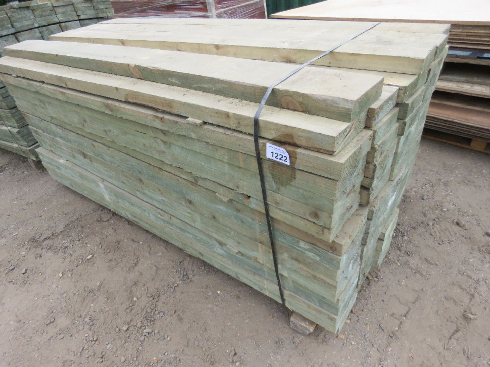STACK OF APPROXIMATELY 100NO TREATED UNUSED TIMBER POSTS 170MM WIDTH X ...