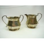 Silver milk jug and sugar basin