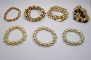 Seven faux pearl bracelets