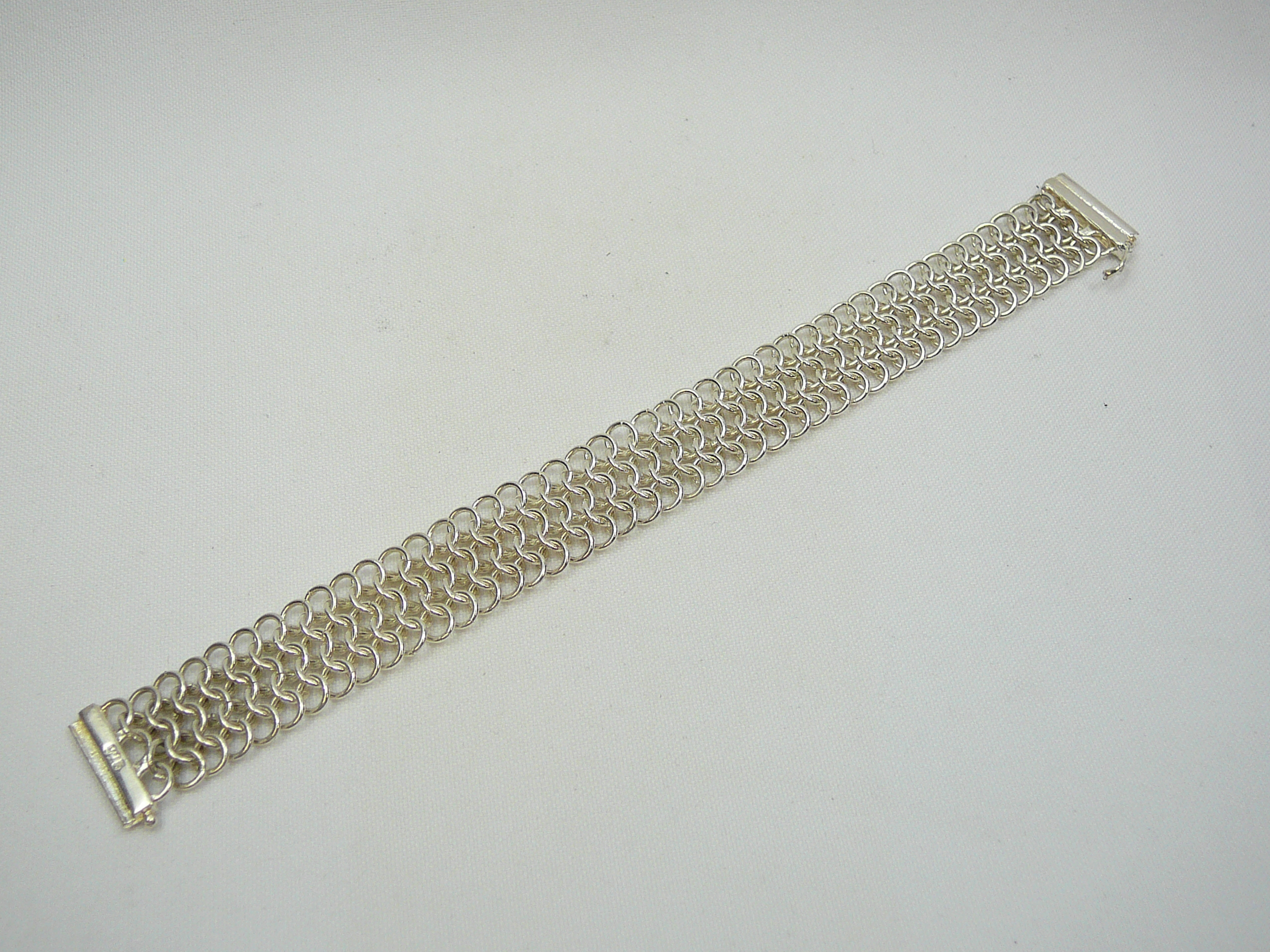 Silver chain mesh bracelet.