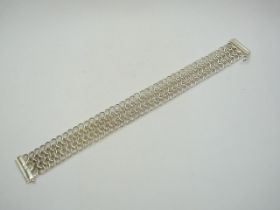 Silver chain mesh bracelet.