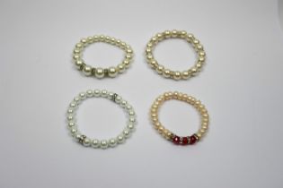 Four faux pearl bracelets