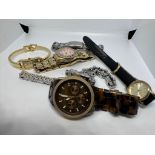 7 assorted quartz watches