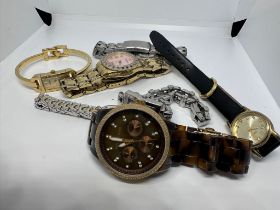 7 assorted quartz watches