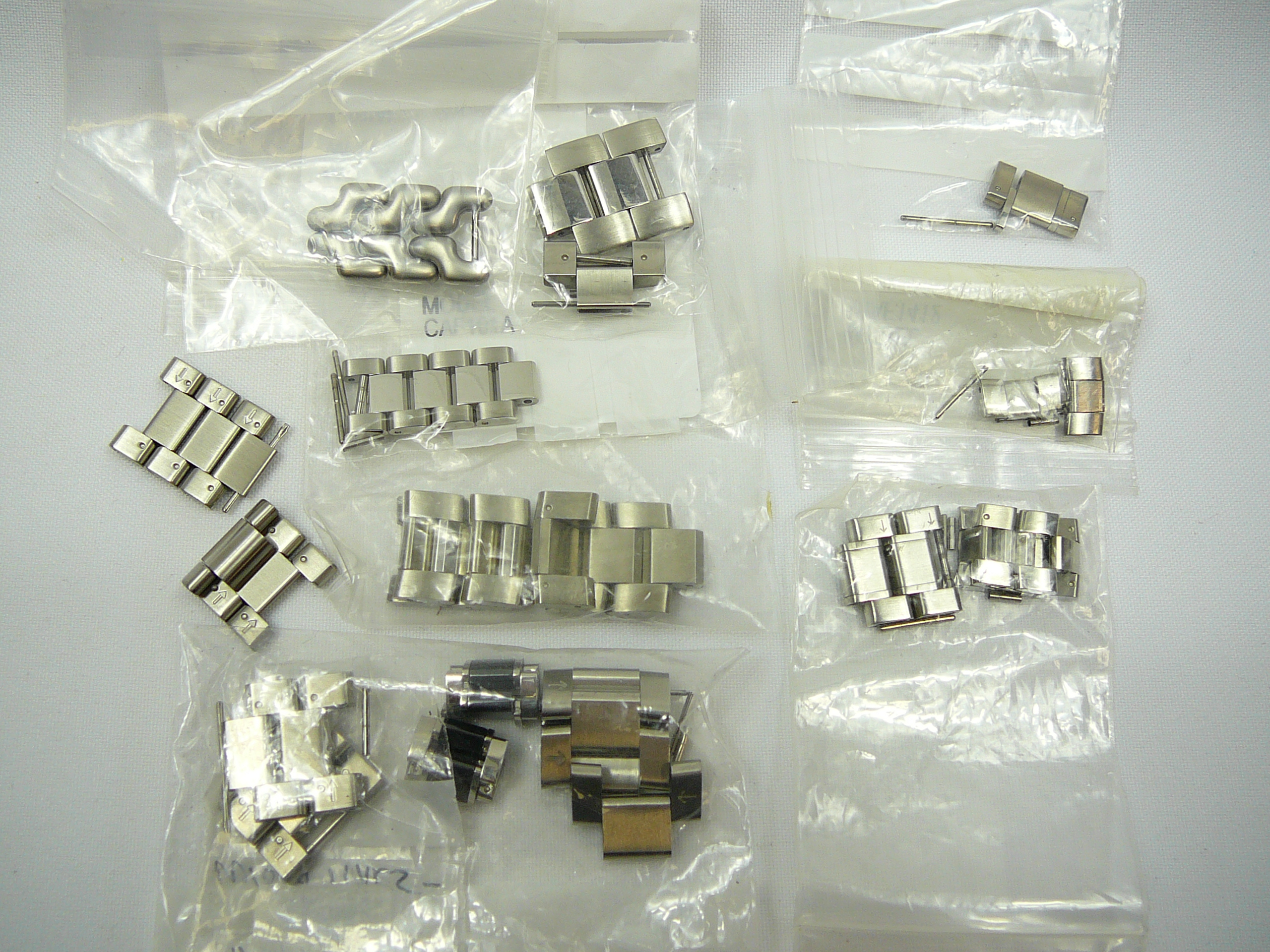 Assd Tag Heuer bracelet links etc