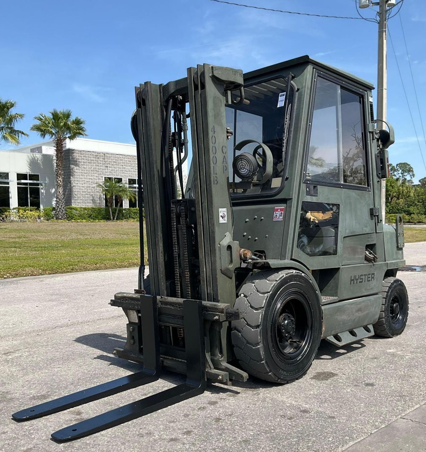 HYSTER FORKLIFT MODEL H40XM, DIESEL, ENCLOSED CAB, APPROX MAX CAPACITY 4,000 LBS, APPROX MAX HE