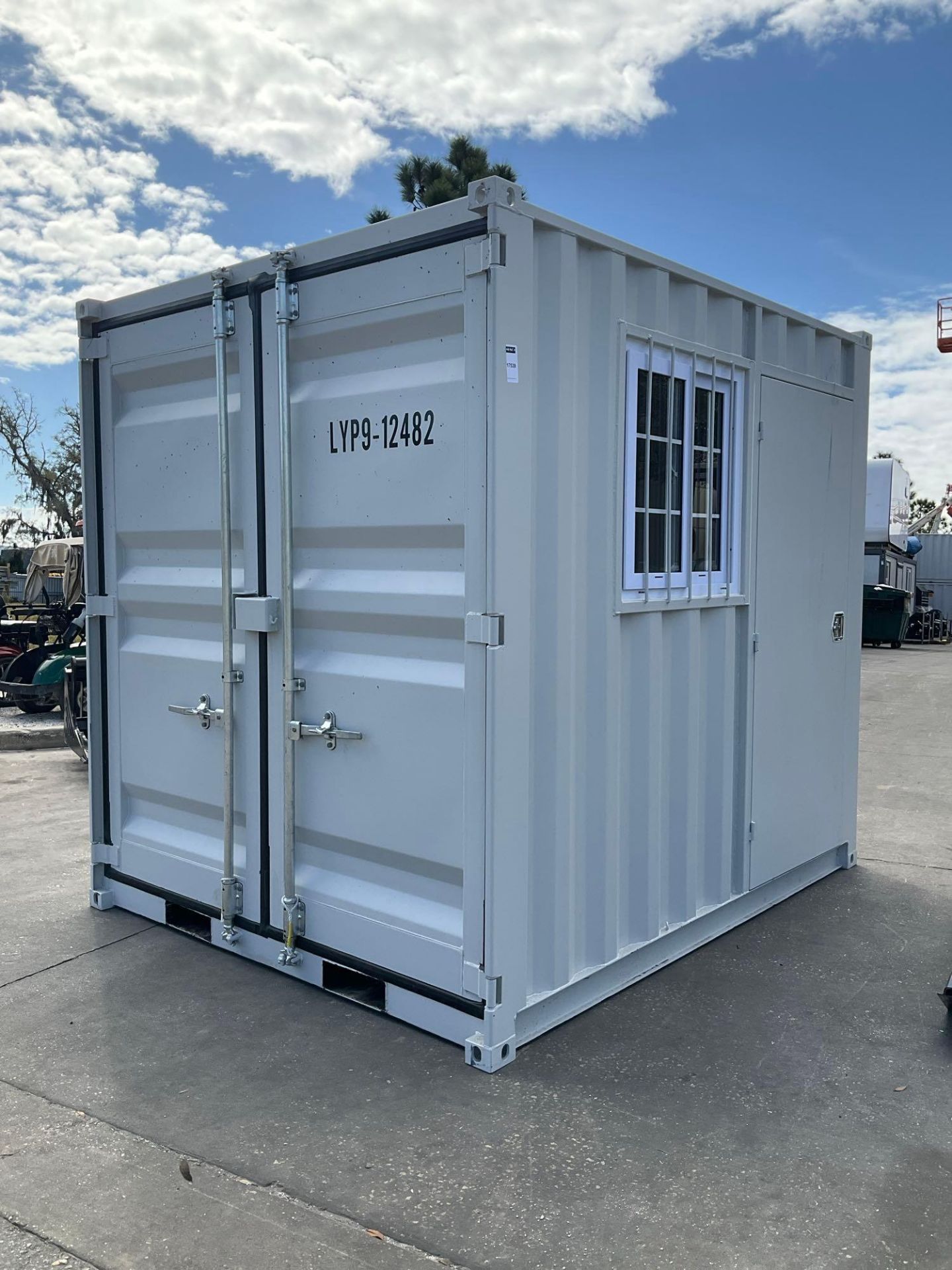9' OFFICE / STORAGE CONTAINER, FORK POCKETS WITH SIDE DOOR ENTRANCE & SIDE WINDOW, APPROX 99'' T x
