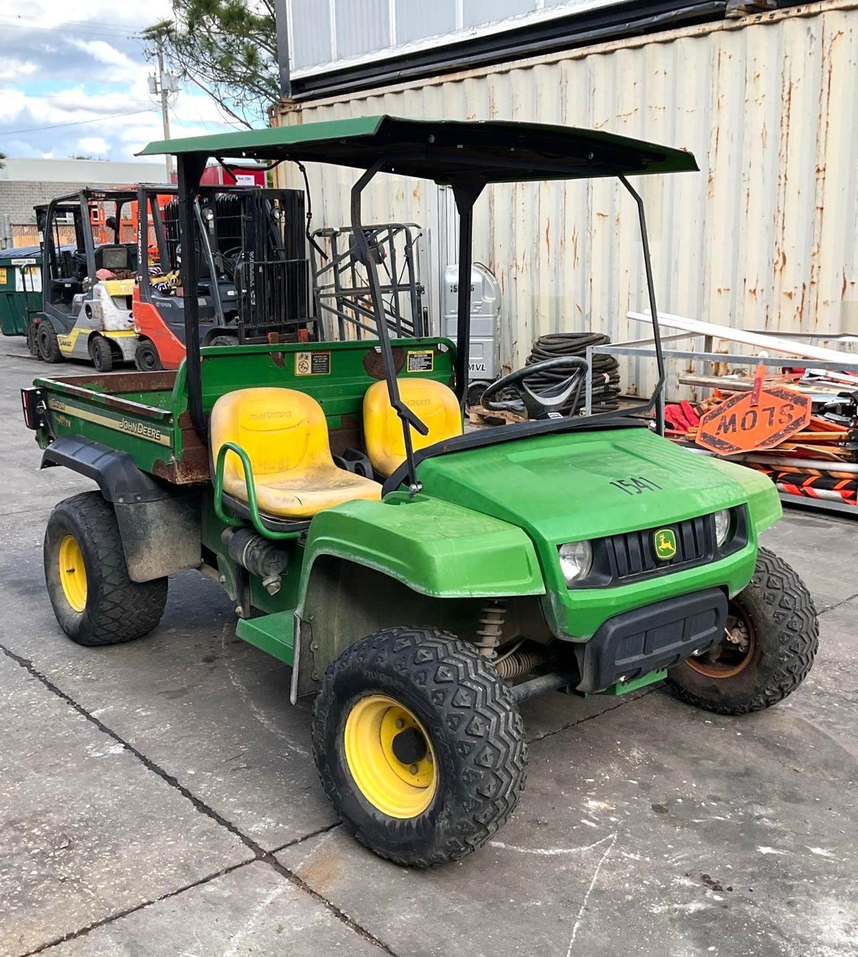 JOHN DEERE GATOR TX UTV, GAS POWERED, HYDRAULIC DUMP BED, HITCH, BILL OF SALE ONLY