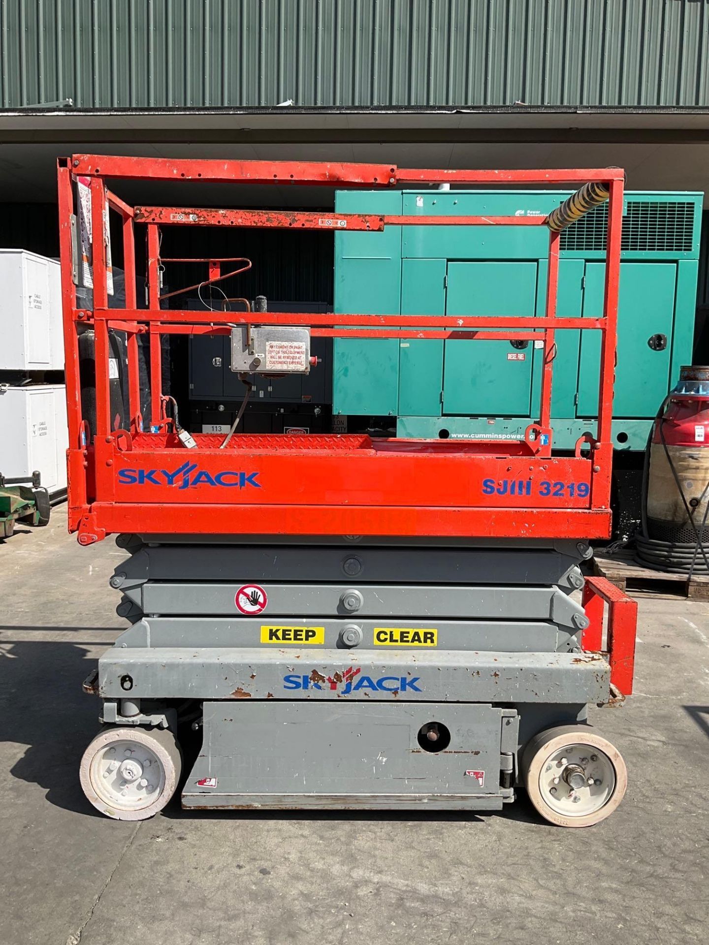 SKYJACK SCISSOR LIFT MODEL SJIII 3219, ELECTRIC, APPROX MAX PLATFORM HEIGHT 19FT, NON MARKING TIRES