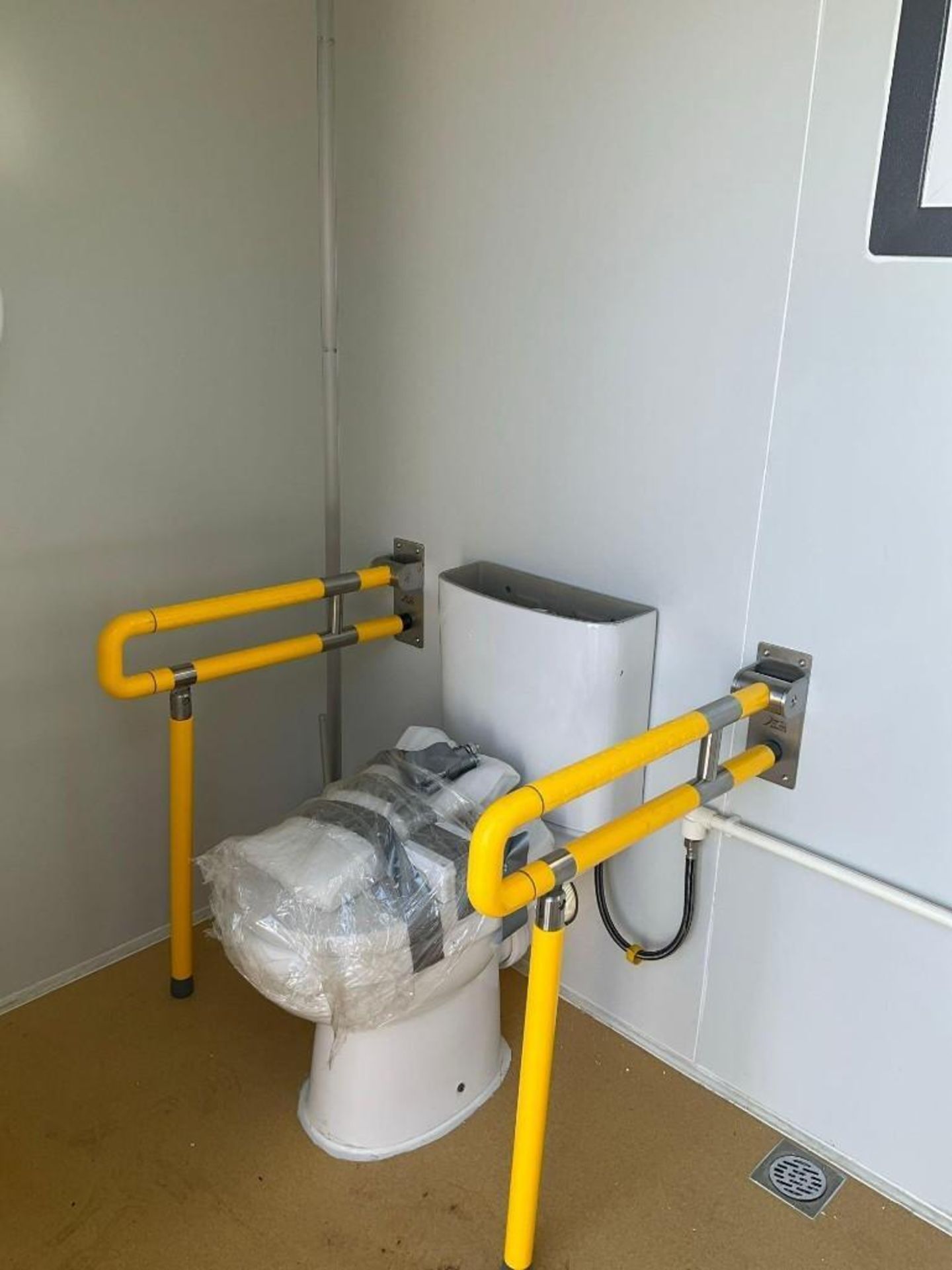 UNUSED PORTABLE HANDICAP BATHROOM UNIT WITH HANDICAP ACCESSIBLE, ELECTRIC & PLUMBING HOOK UP WITH... - Image 17 of 18