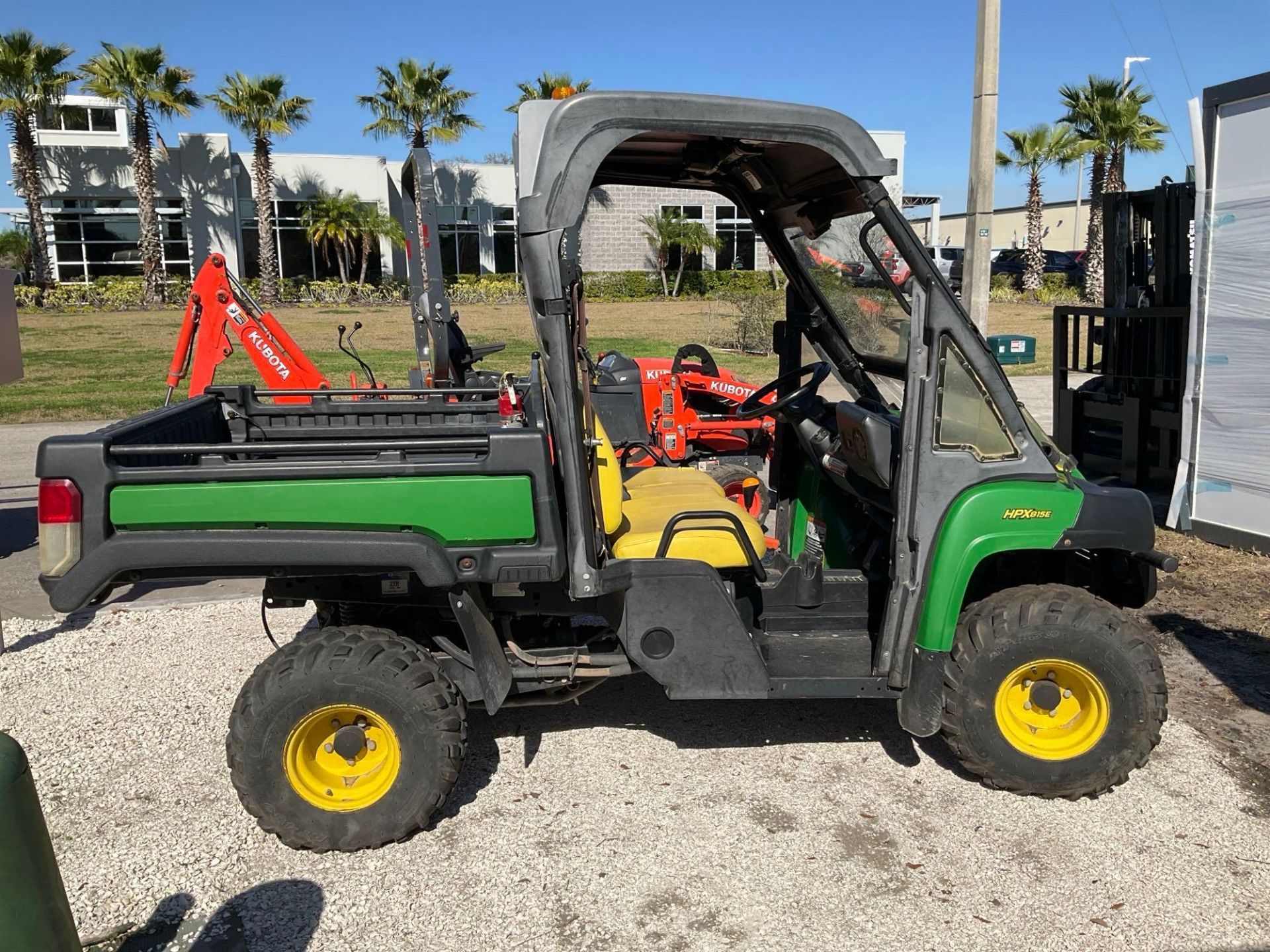 JOHN DEERE GATOR UTV MODEL HPX 815E, DIESEL, 4WD, MANUEL DUMP BED , HITCH, RUNS & OPERATES - Image 2 of 14