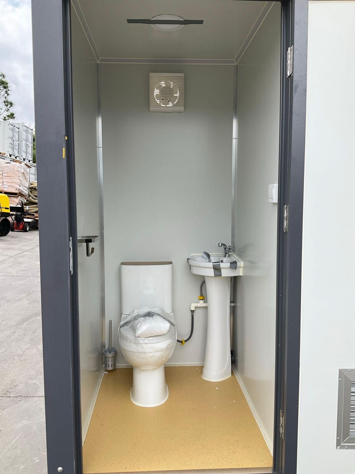 UNUSED PORTABLE DOUBLE BATHROOM UNIT, 2 STALLS, ELECTRIC & PLUMBING HOOK UP WITH EXTERIOR PLUMBIN... - Image 11 of 14
