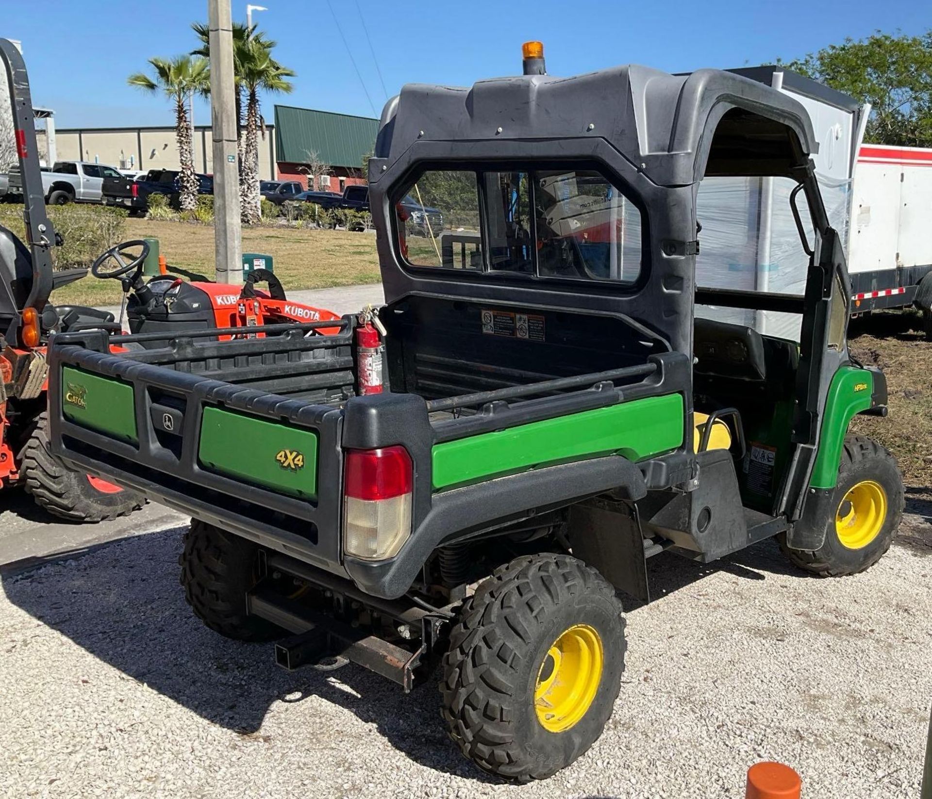 JOHN DEERE GATOR UTV MODEL HPX 815E, DIESEL, 4WD, MANUEL DUMP BED , HITCH, RUNS & OPERATES - Image 3 of 14