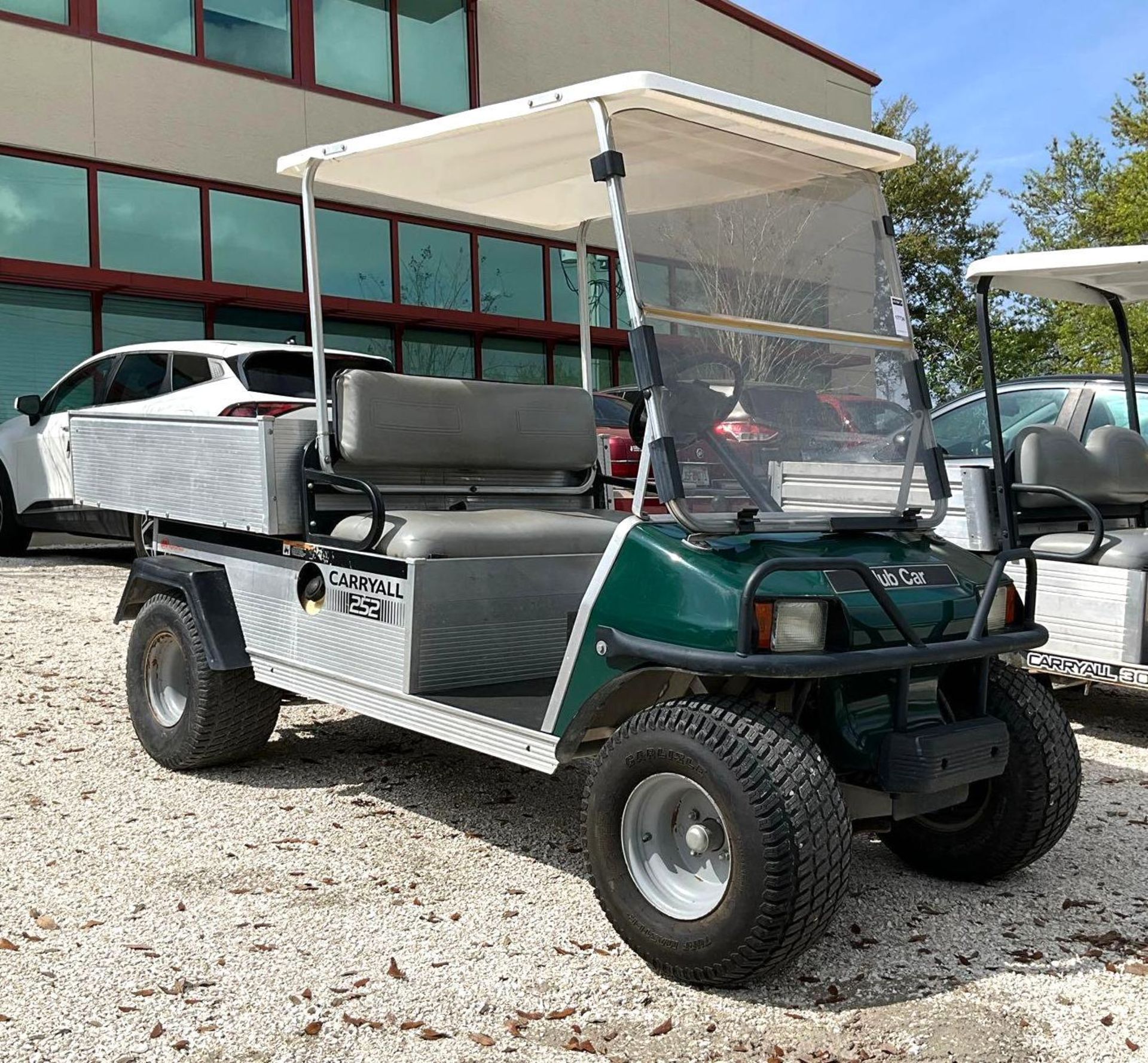 CLUB CAR CARRYALL 252 , GAS POWERED, MANUAL DUMP BED, HITCH , BILL OF SALE ONLY, RUNS & DRIVES