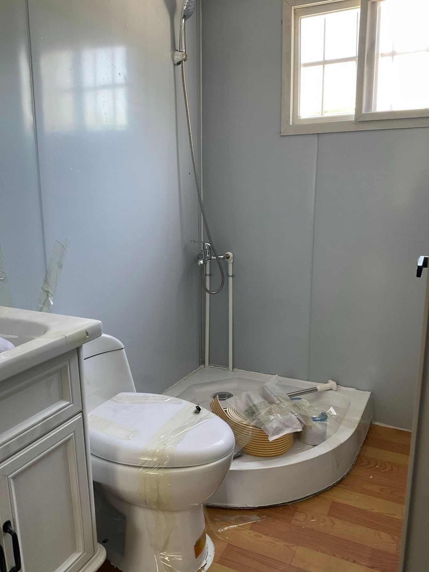 UNUSED EXPANDABLE HOUSE  SHOWER ROOM, TOILET,  PLUMBING AND ELECTRIC HOOK UP, 110V,  LIGHTING , A... - Image 18 of 21
