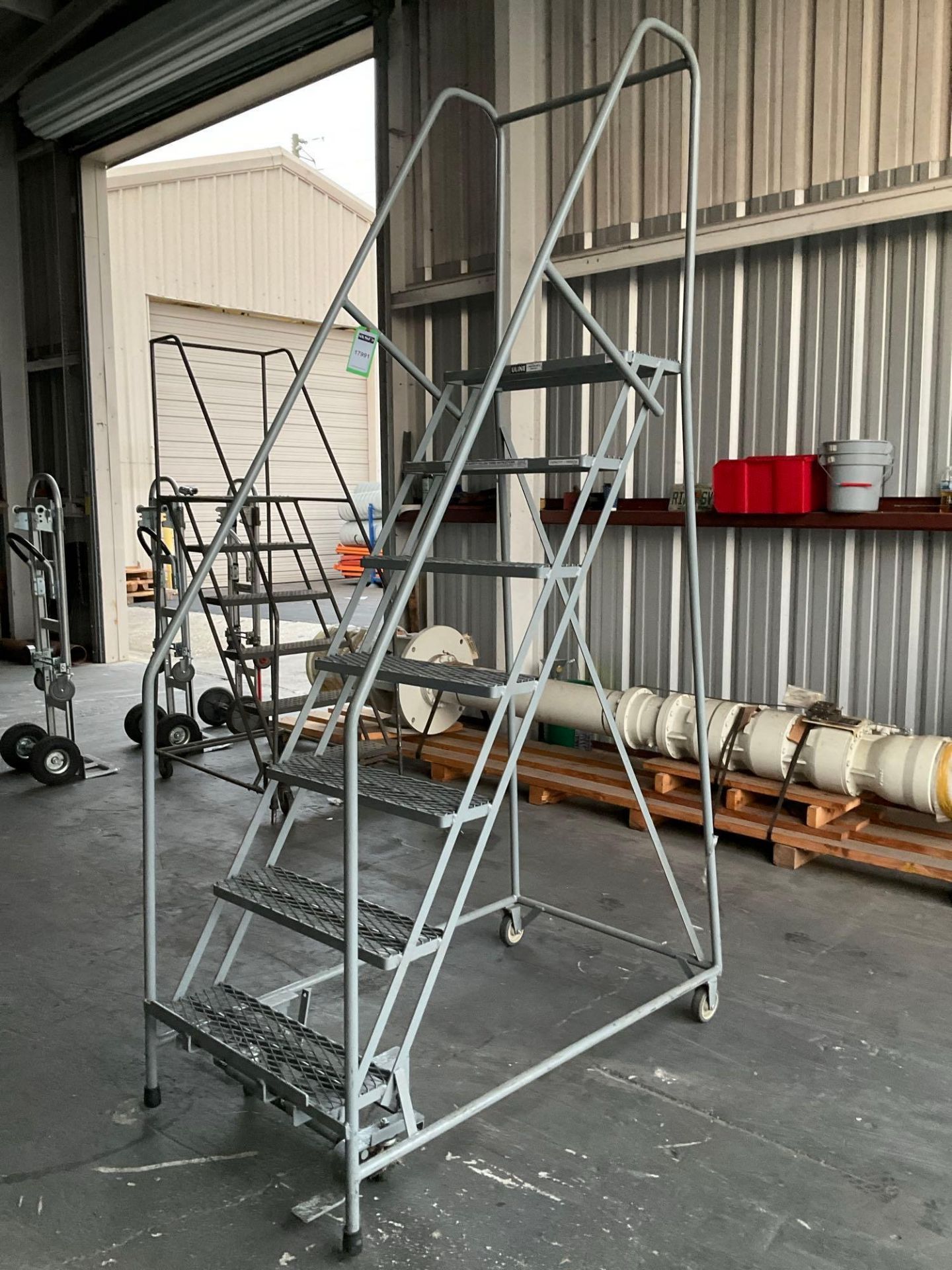 ULINE...SAFETY LADDER WITH WHEELS , APPROX 100? T - Image 3 of 8