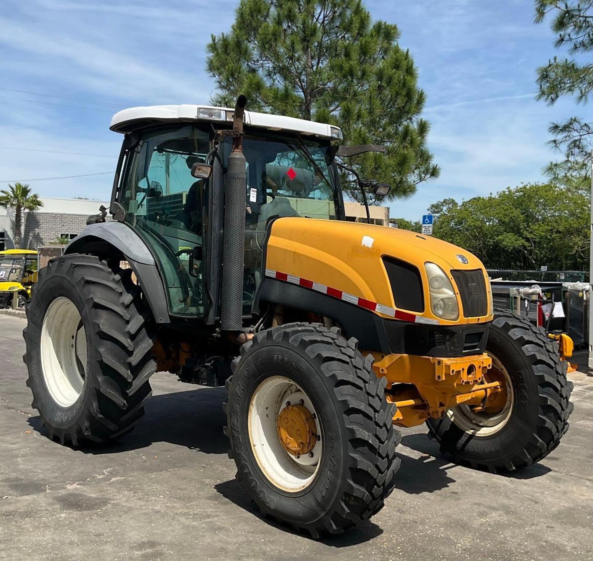 NEW HOLLAND TS135A TRACTOR, DIESEL, ENCLOSED CAB, 4WD , COLD AC, RUNS & OPERATES